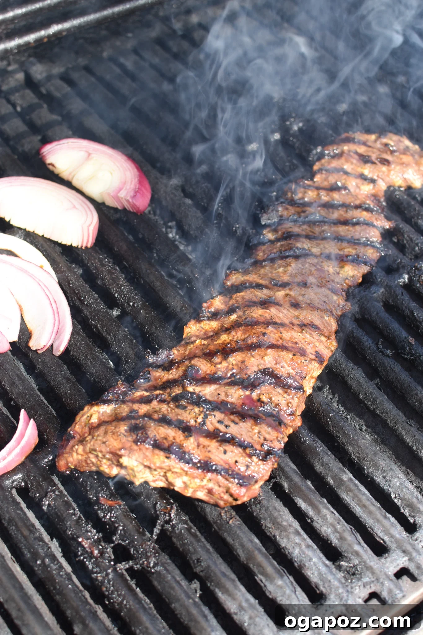 Quick Beef Gyro Wraps 10 Skirt steak grilling on an outdoor barbecue for Easy Beef Gyros