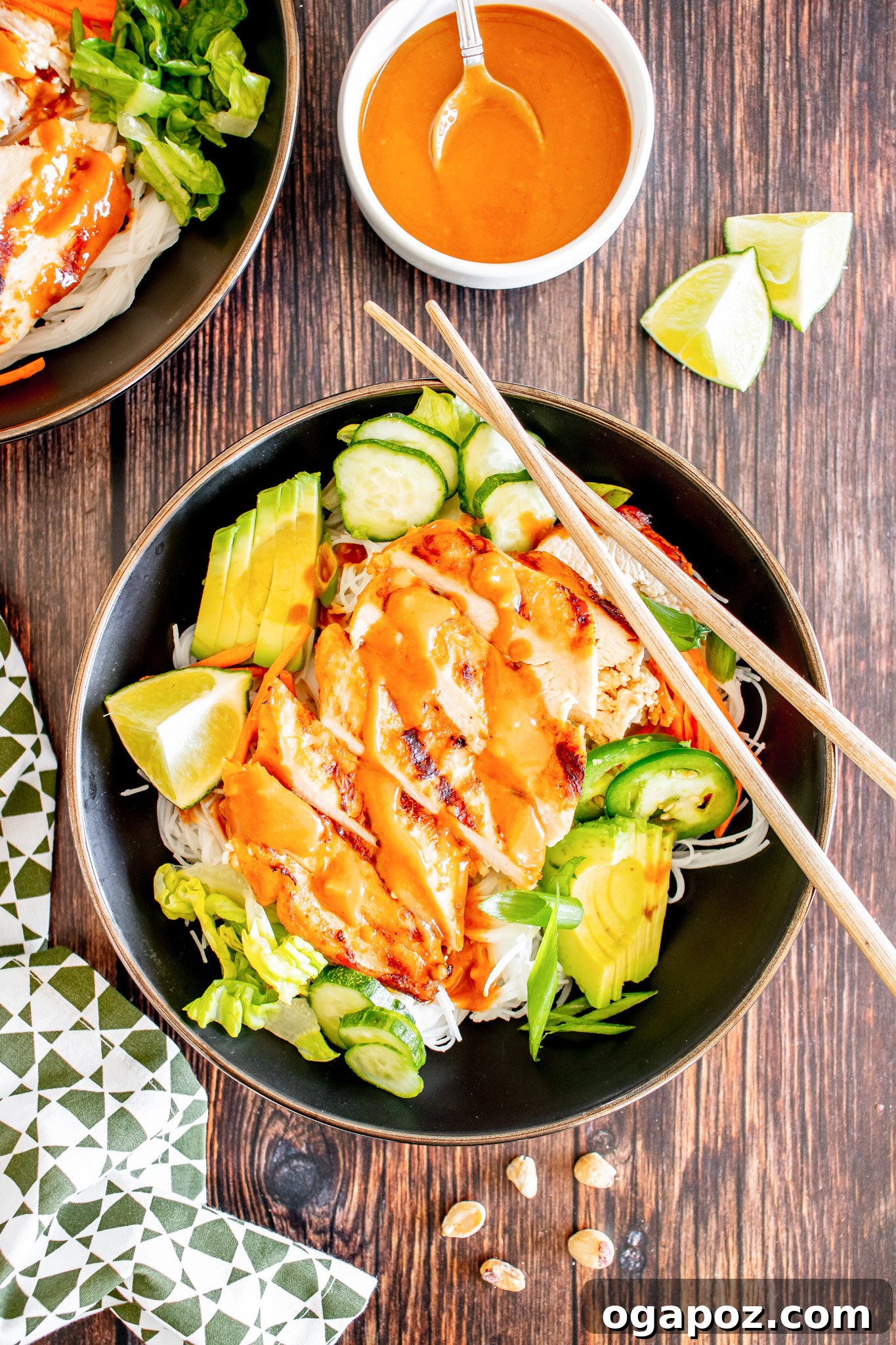 Vibrant Thai Chicken Noodle Salad 5 A bowl of Thai Chicken Noodle Salad with chopsticks resting on the rim, ready to be enjoyed.