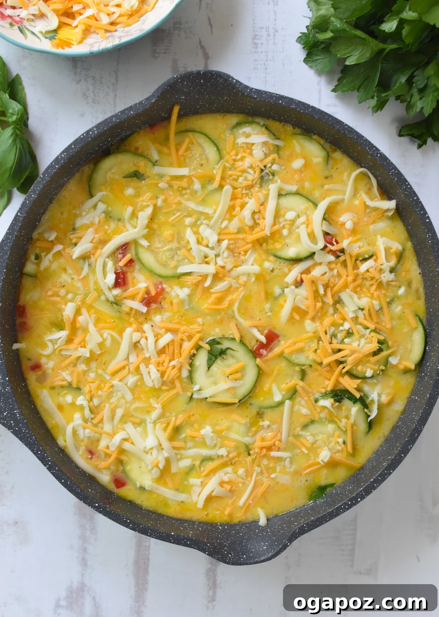 Golden Zucchini Frittata 13 Zucchini Frittata Recipe with cheese on the eggs.