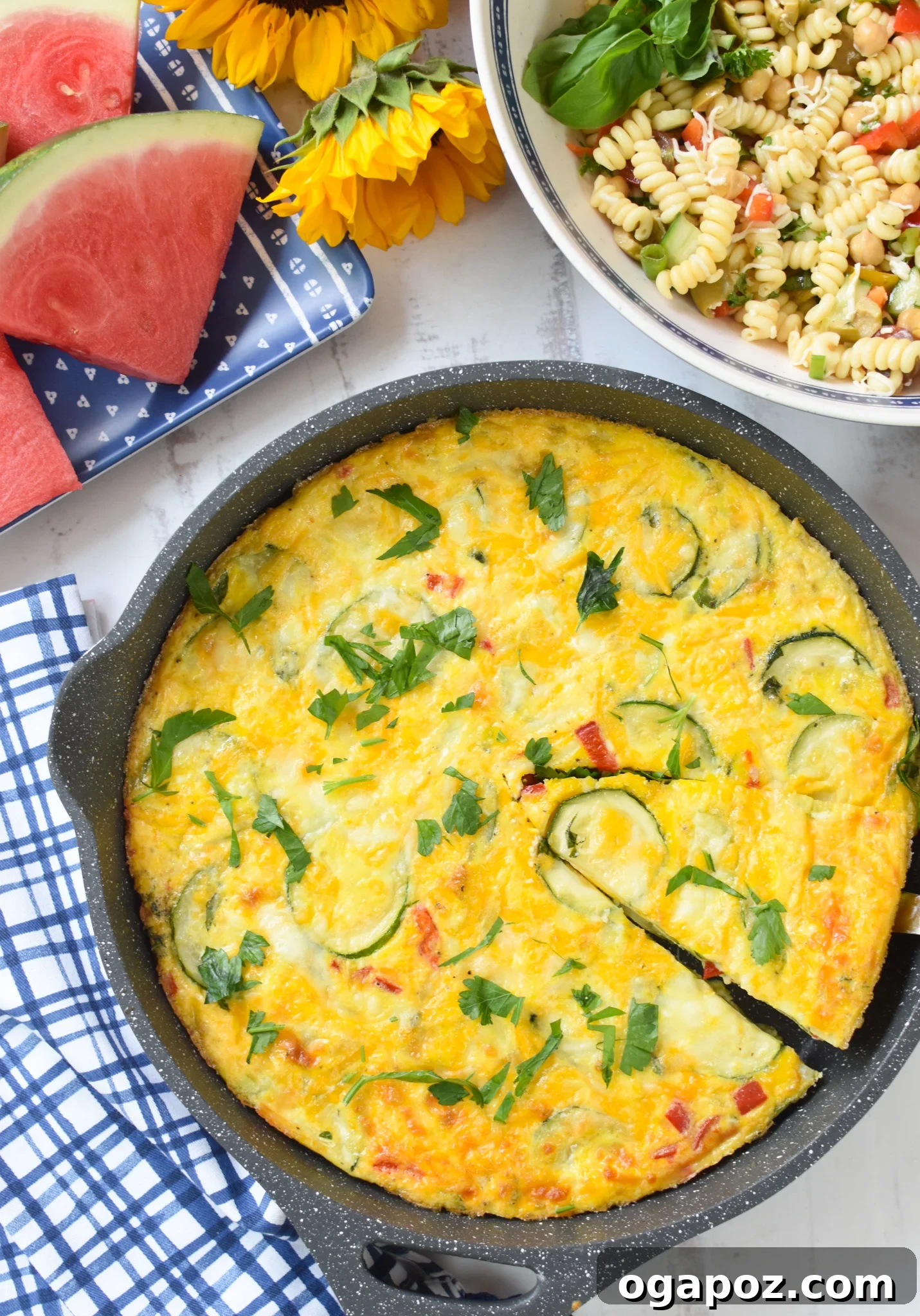 Golden Zucchini Frittata 8 Zucchini Frittata Recipe on a blue napkin.