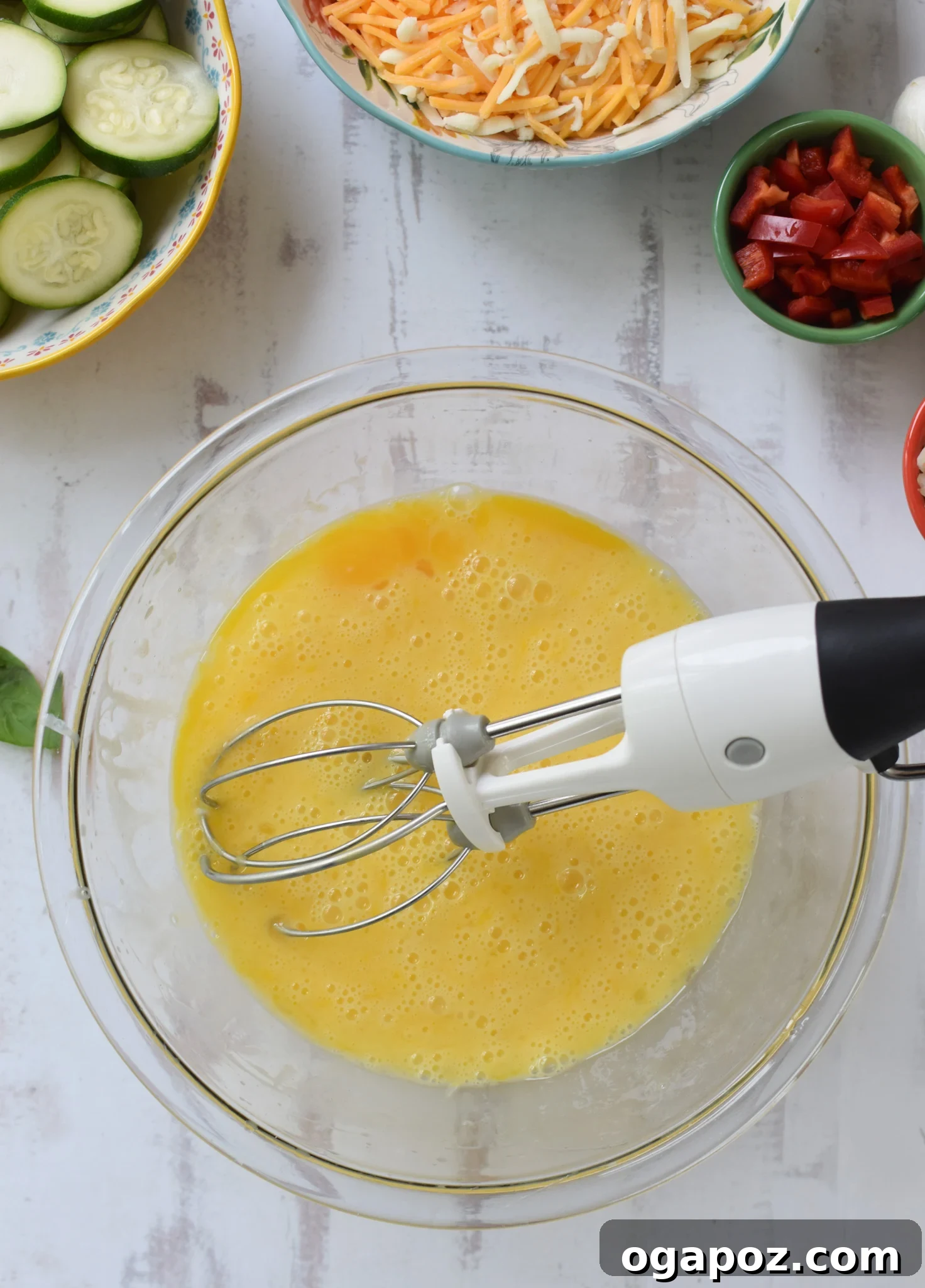 Golden Zucchini Frittata 9 Zucchini Frittata Recipe with whisk.