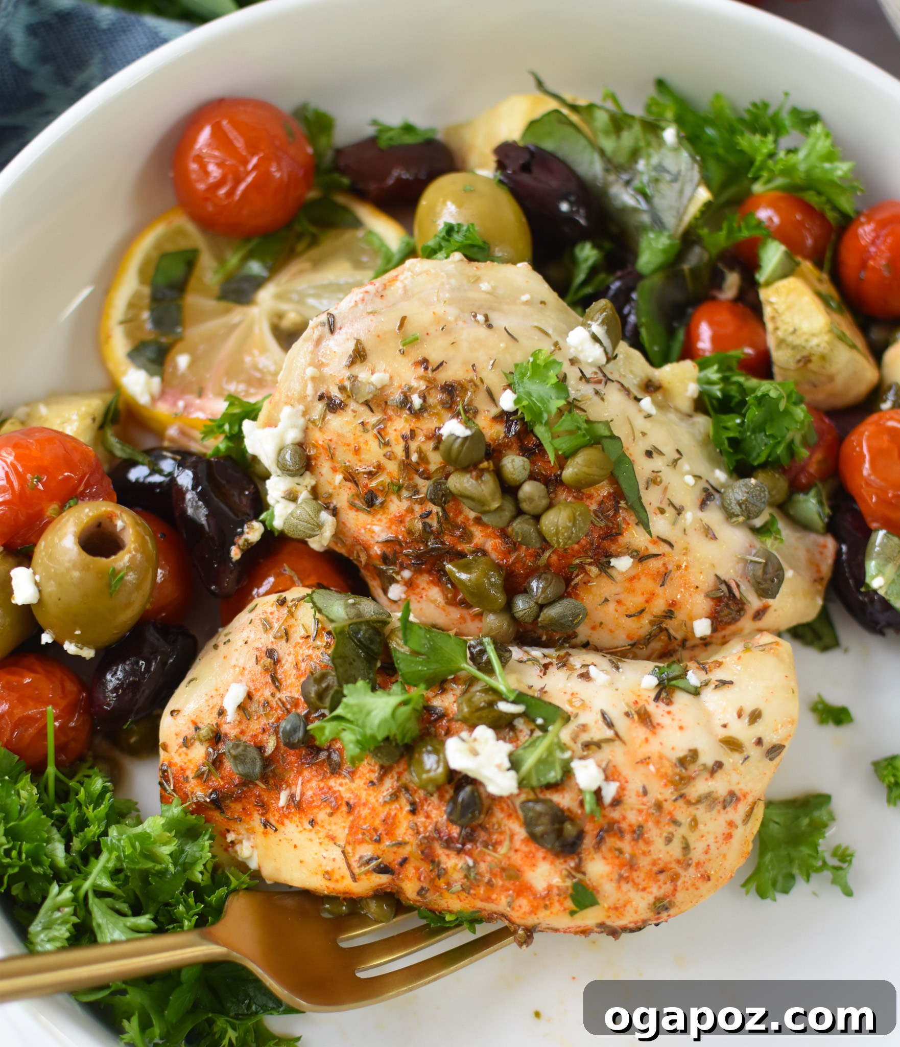 Vibrant Mediterranean Skillet Chicken 5 Mediterranean Skillet Chicken in a skillet, garnished with fresh herbs.