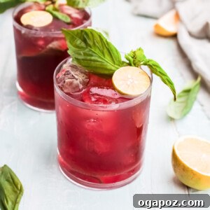 Vodka Cherry Limeade in two glasses.