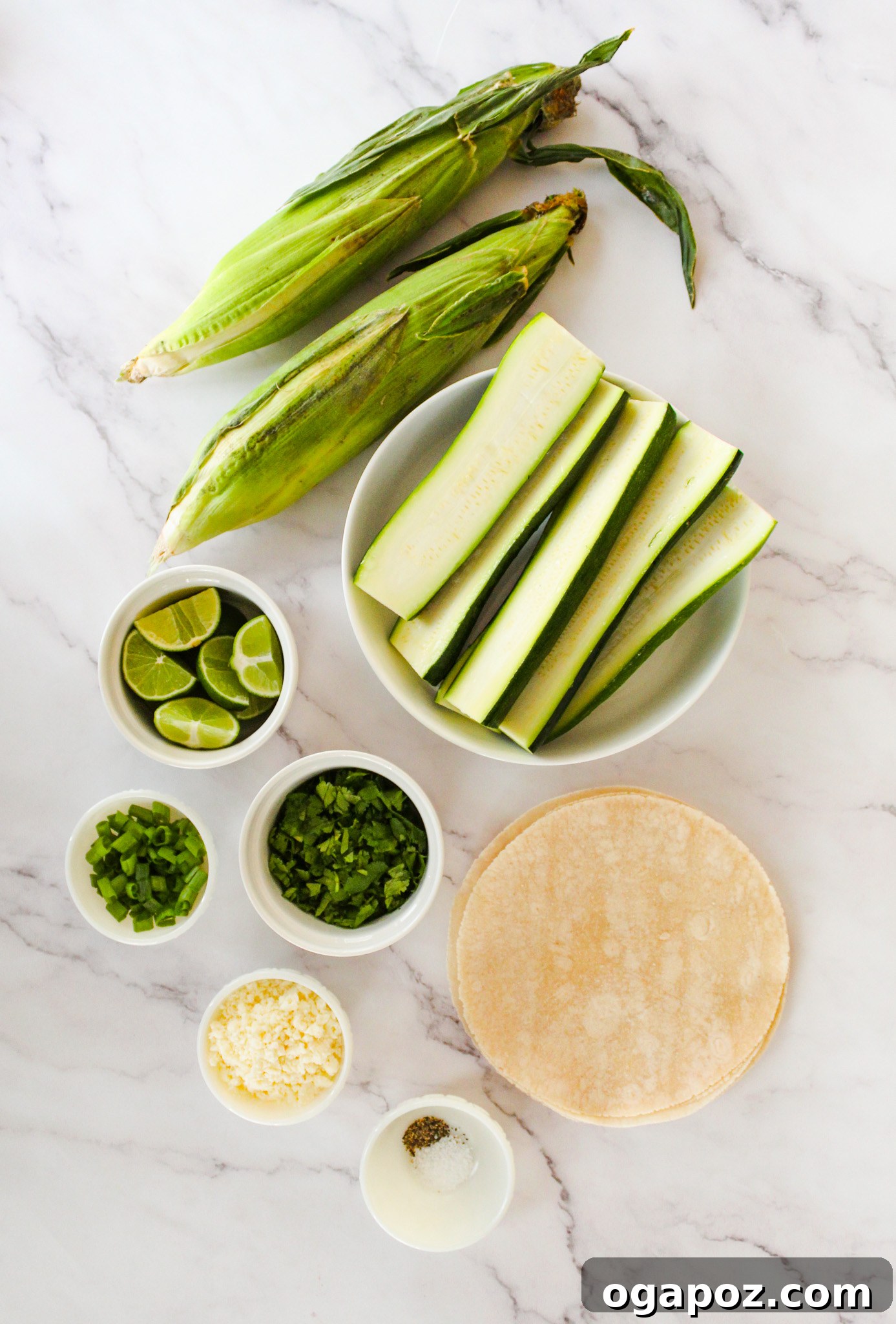 Effortless Zucchini Tacos 3 Fresh ingredients for Easy Zucchini Tacos, including zucchini, corn, spices, and cilantro.