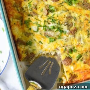Savory Cottage Cheese Egg Bake 11 A close-up image of a square of Cottage Cheese Baked Eggs, showcasing its rich texture and cheesy goodness, ready for enjoyment.
