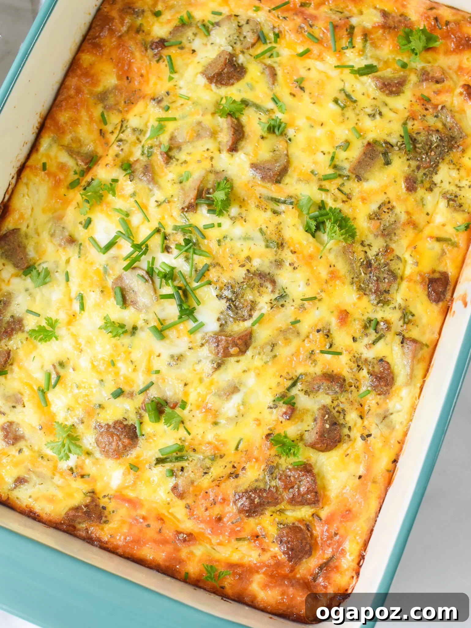 Savory Cottage Cheese Egg Bake 9 A freshly baked Cottage Cheese Baked Eggs casserole, featuring a golden-brown top and bubbling edges, presented invitingly in its baking dish.