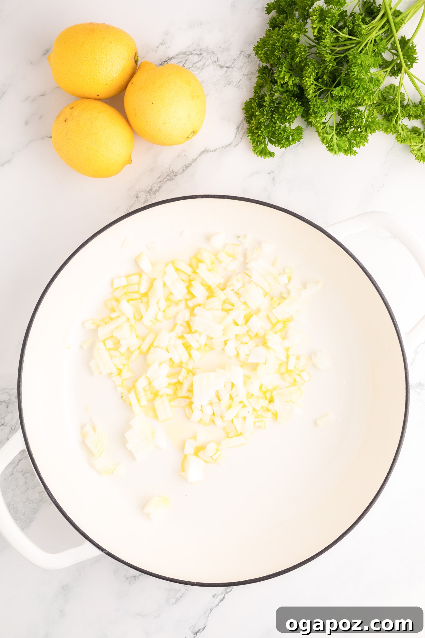 Velvety Lemon Ricotta Pasta 6 Finely diced shallots and minced garlic sizzling in olive oil in a skillet, creating an aromatic and flavorful base for the pasta sauce.