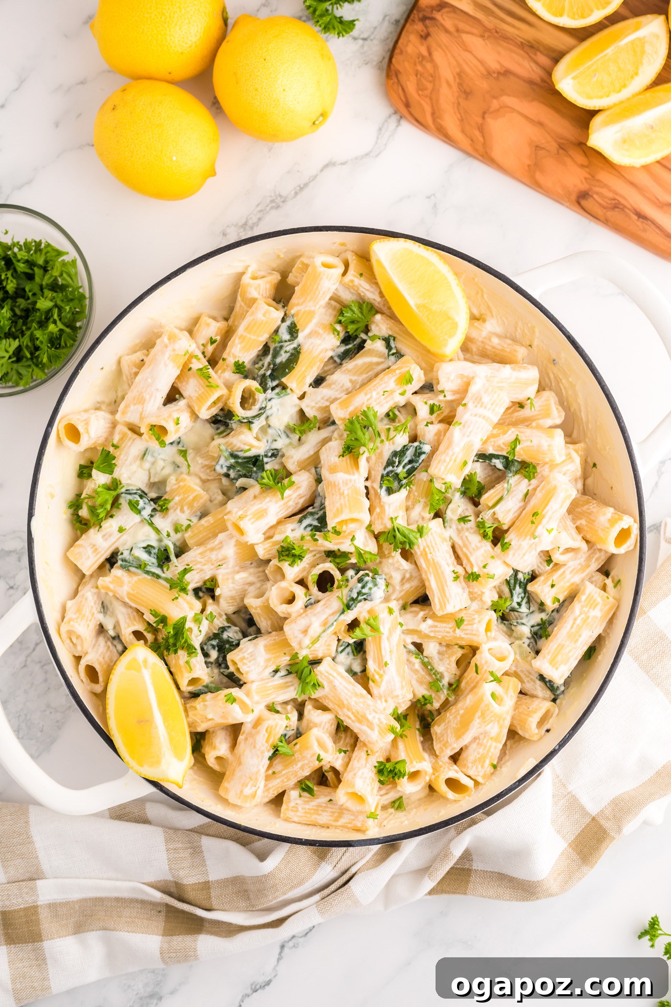 Velvety Lemon Ricotta Pasta 9 All the lemon ricotta pasta ingredients beautifully mixed in a large pot, with the creamy sauce clinging to the pasta, ready to be served.