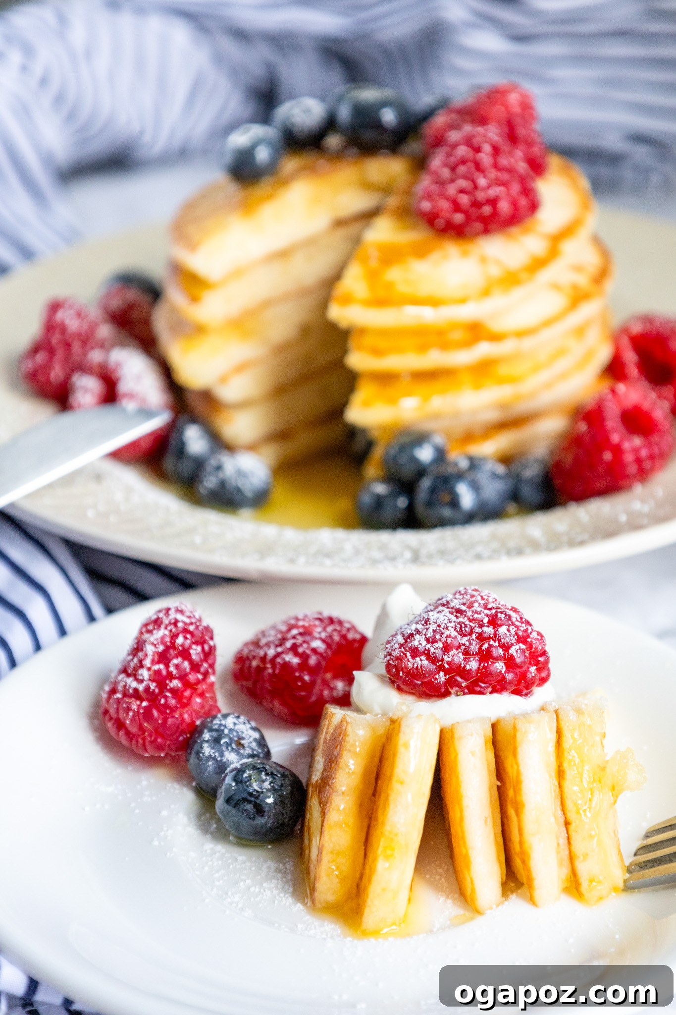 Fluffy Buttermilk Pancake Bliss 4 Close-up of a stack of homemade buttermilk pancakes, sliced to show their fluffy texture.