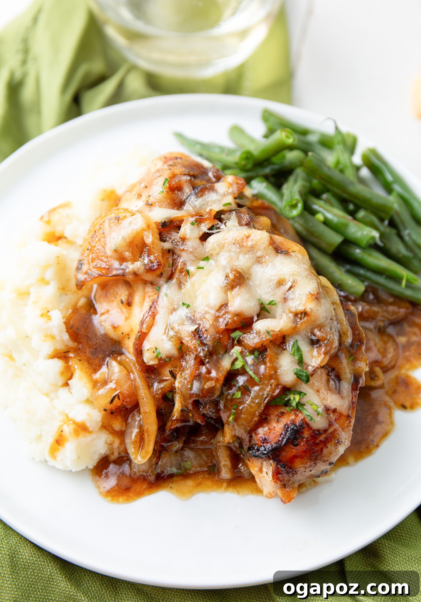 French Onion Smothered Chicken 3 Plated French Onion Chicken, showcasing the melted cheese and onions.