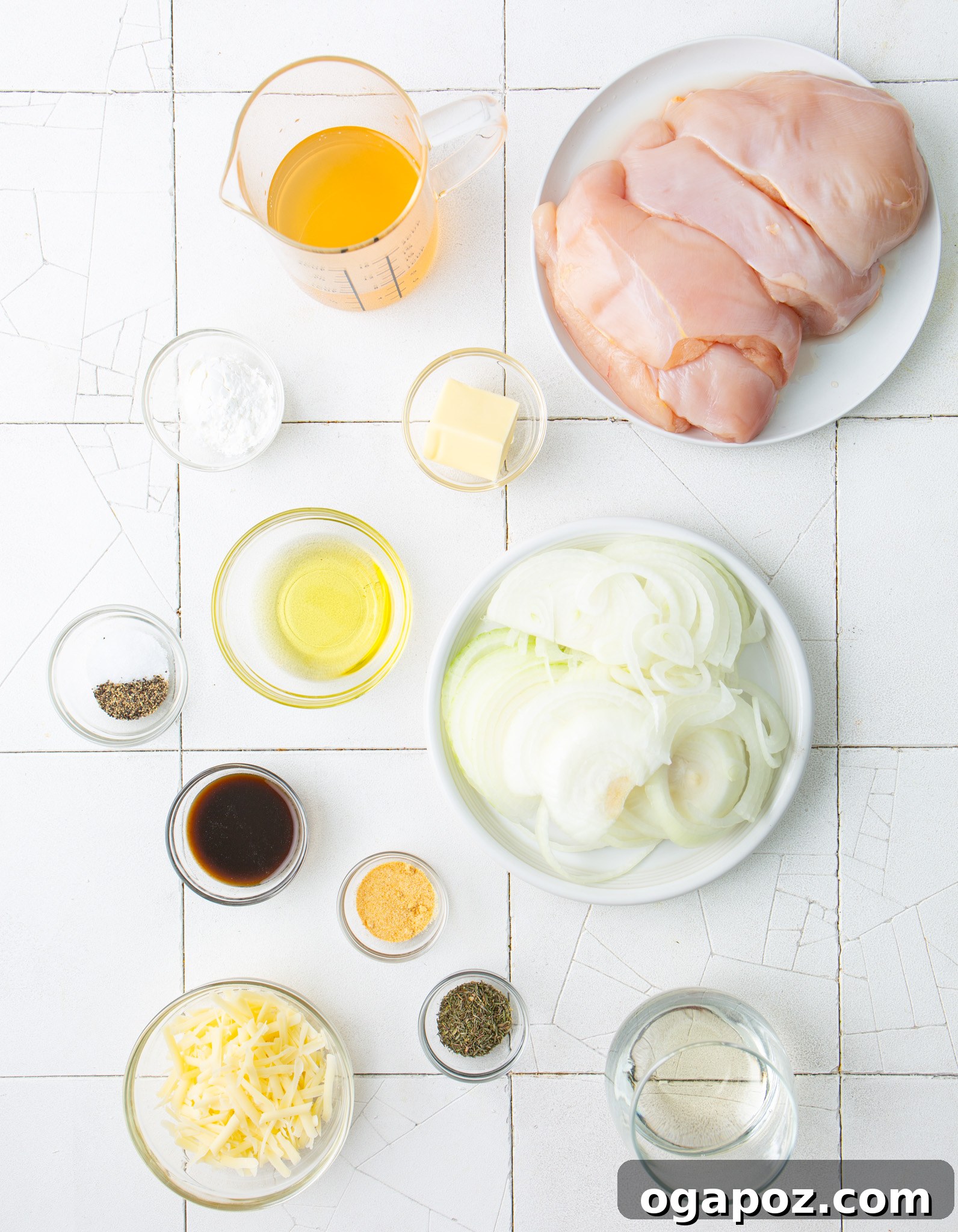 French Onion Smothered Chicken 6 Ingredients for French Onion Chicken laid out on a board.