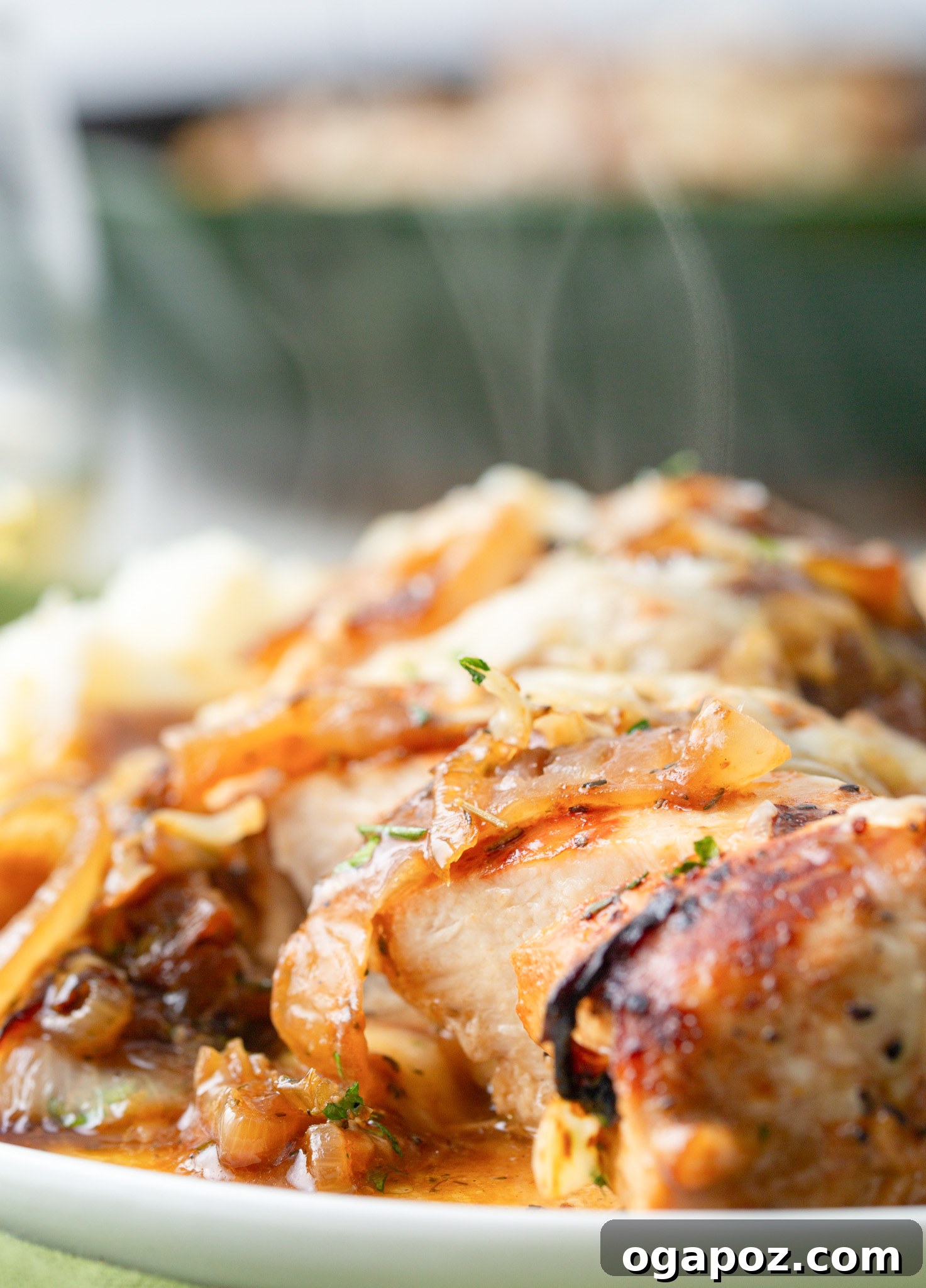 French Onion Smothered Chicken 7 A close-up of French Onion Chicken, highlighting the rich sauce and cheese.