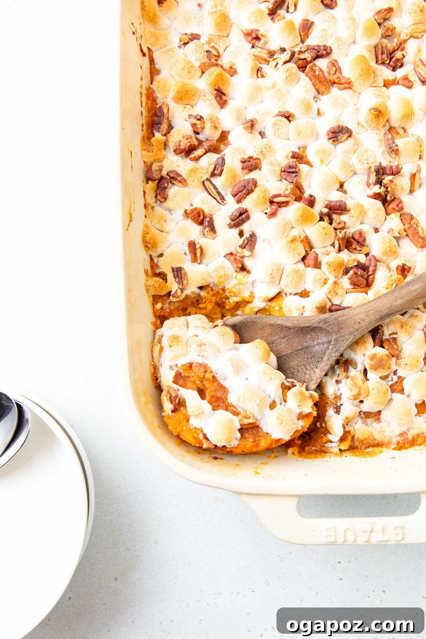 Sweet Potato Casserole with Marshmallows in a casserole dish, topped with golden-brown marshmallows, ready to be served for a holiday meal