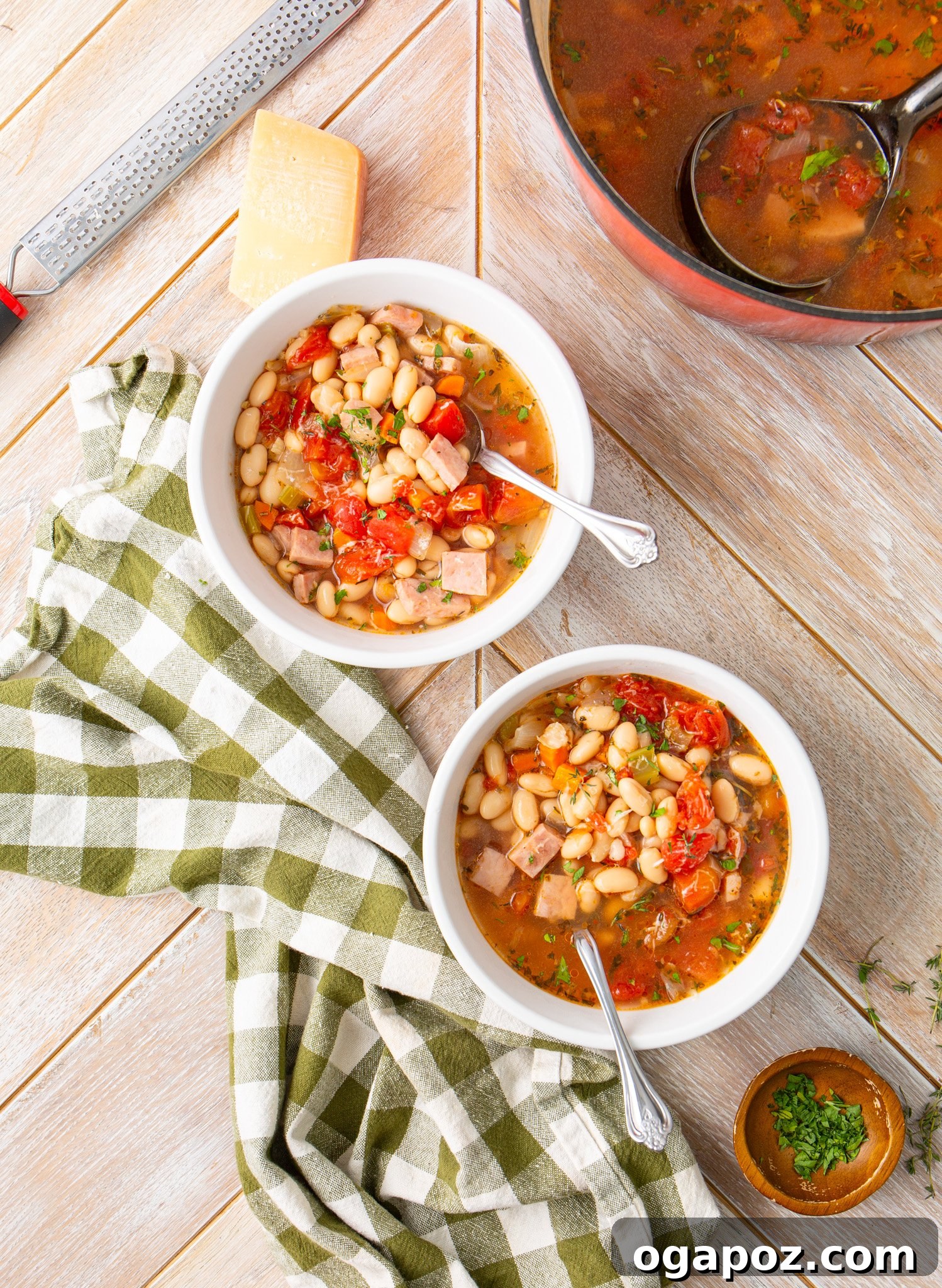 Hearty Navy Bean Soup 12 Two steaming bowls of Navy Bean Soup, garnished and ready to be enjoyed, highlighting its appeal as a shared meal.