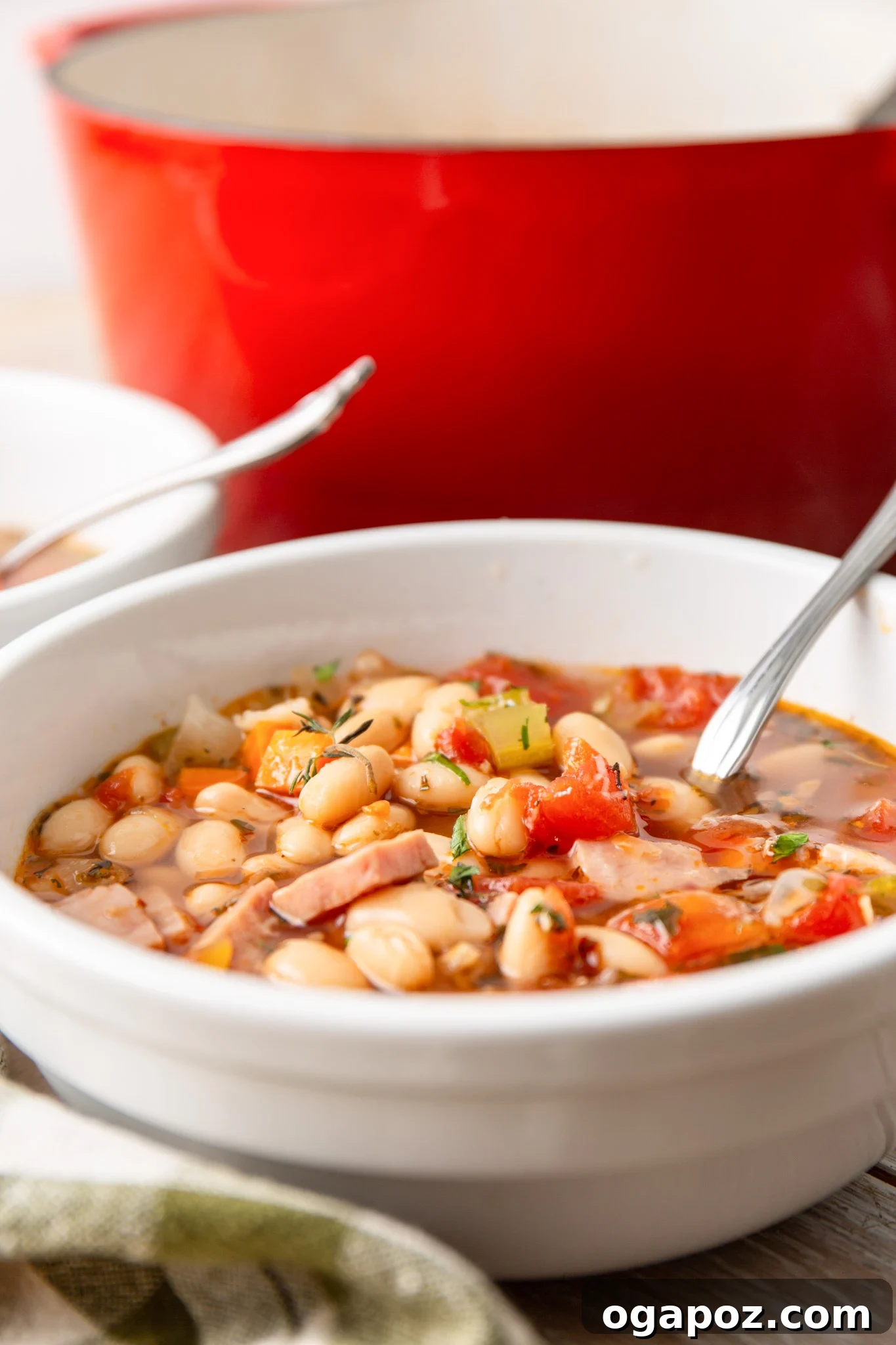 Hearty Navy Bean Soup 3 A large pot of Navy Bean Soup simmering on the stove, ready to be served, capturing the essence of home cooking.