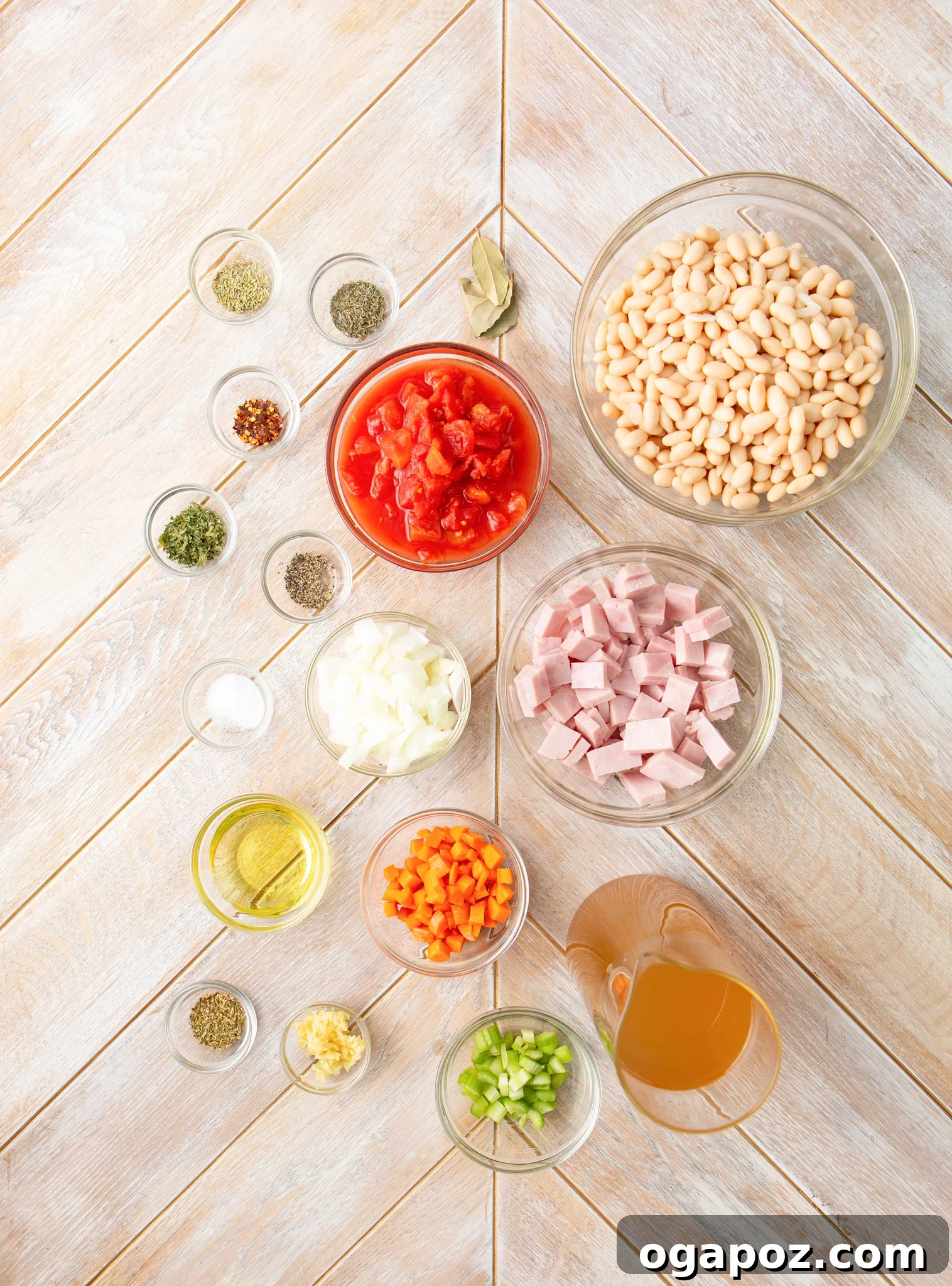 Hearty Navy Bean Soup 6 Fresh ingredients laid out for Navy Bean Soup, including beans, diced ham, and assorted vegetables.