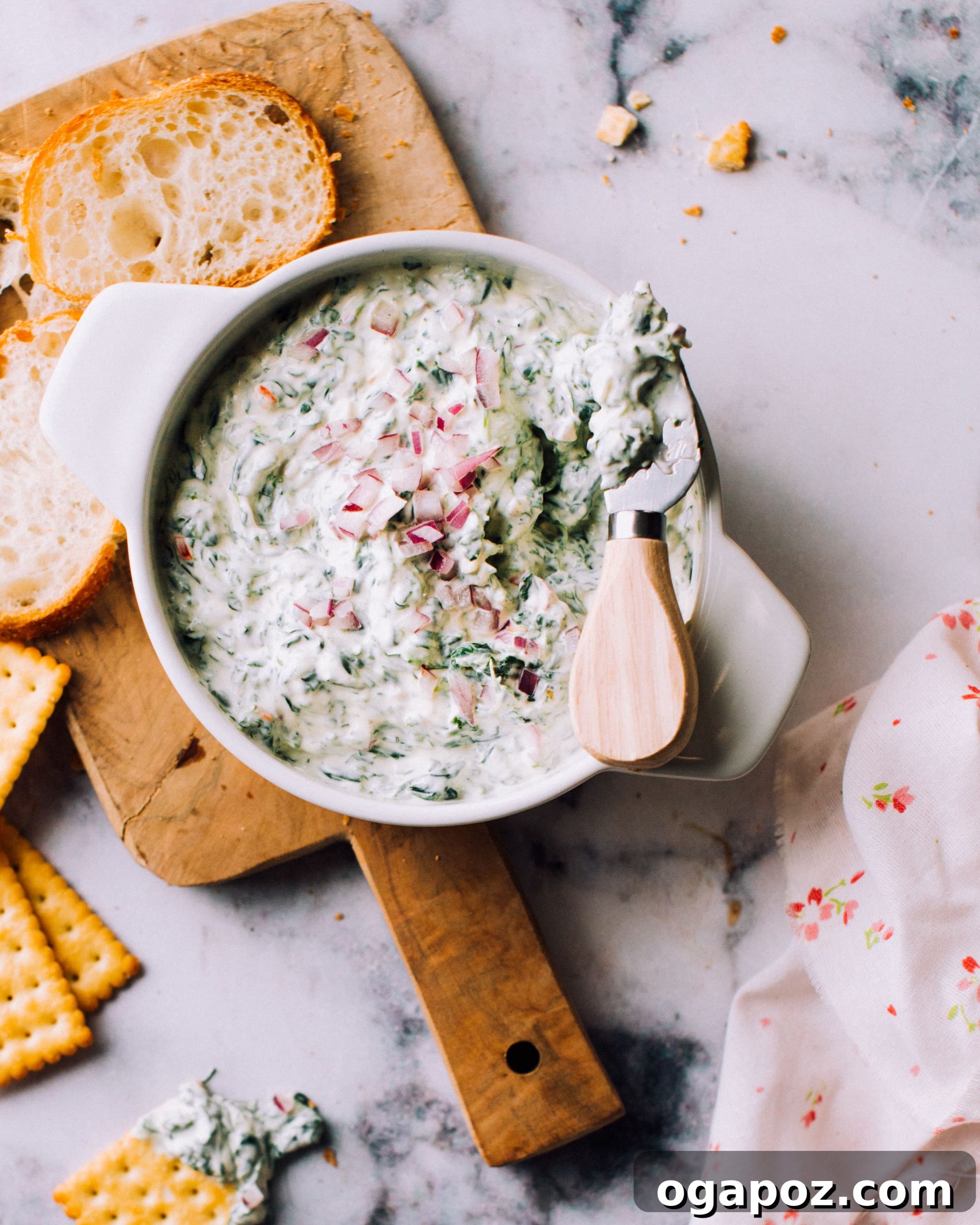Velvety Sour Cream Spinach Dip 2 Delicious Homemade Spinach Dip ready to be served on a platter