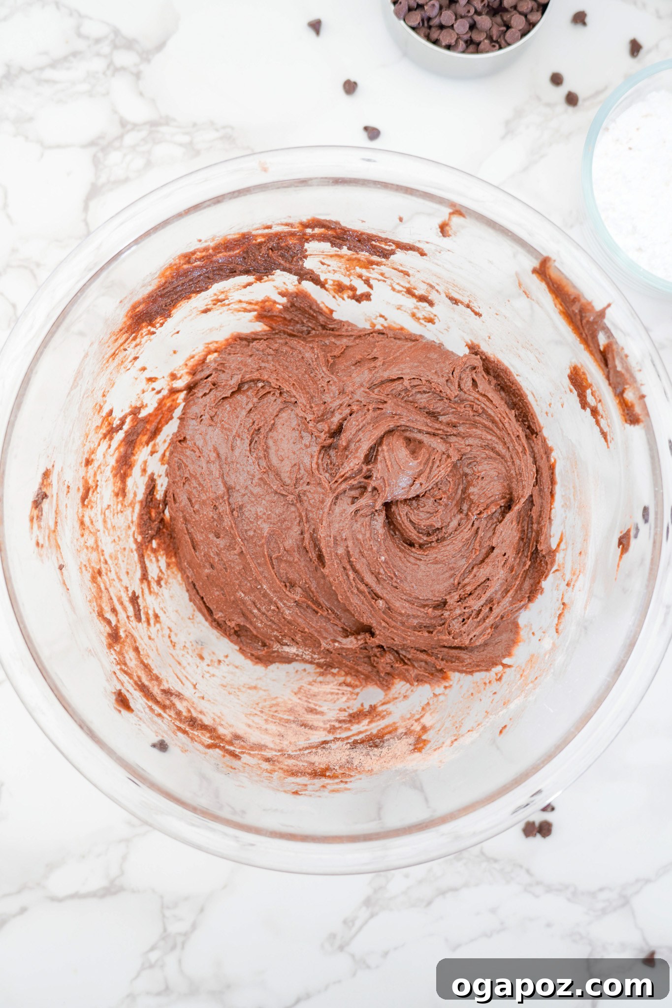 Decadent Chocolate Crinkle Cookies 7 Chocolate Crinkle Cookie Recipe dough fully mixed in a bowl, showing its rich, dark consistency.
