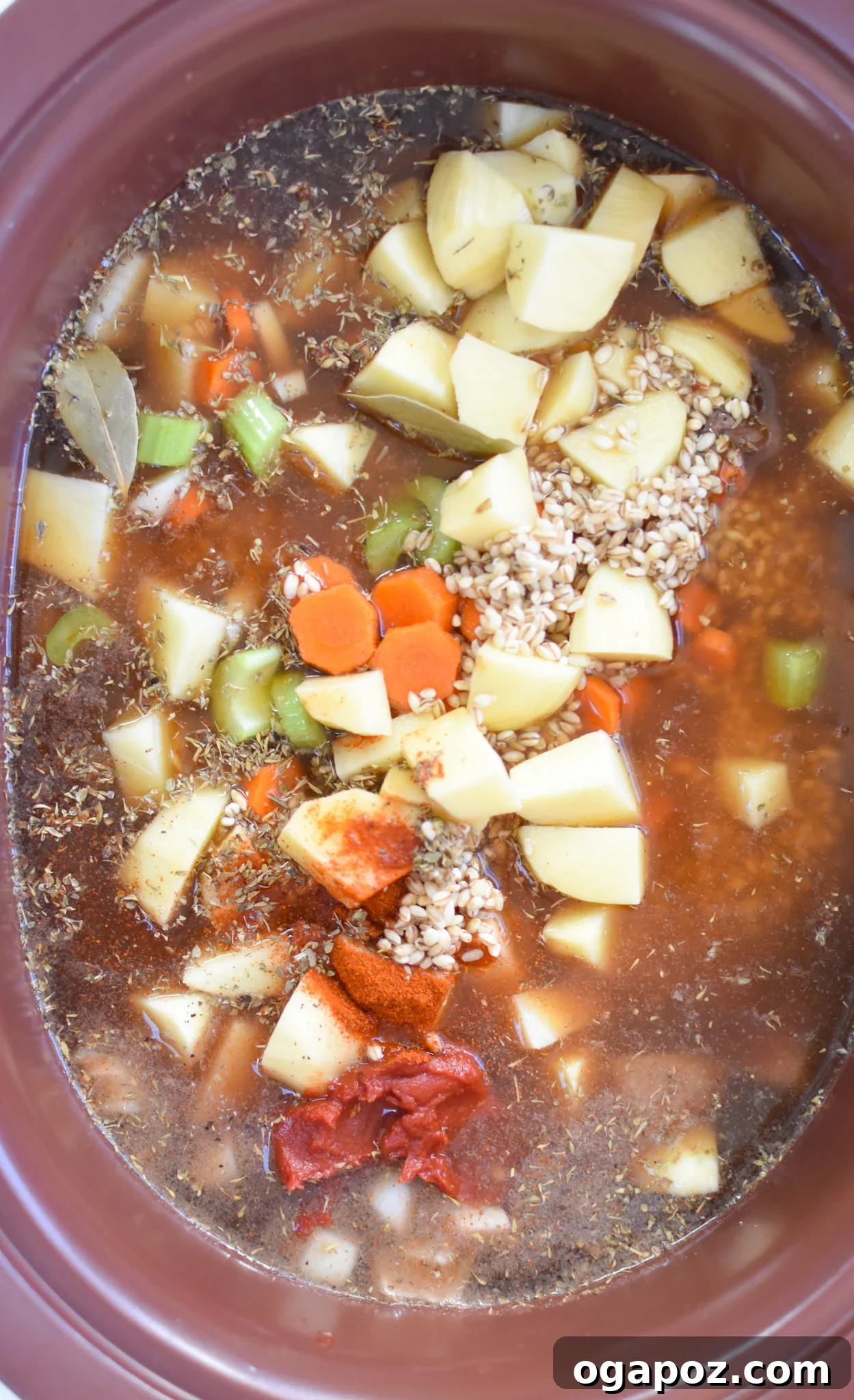 Hearty Slow-Simmered Beef Barley Soup 9 All ingredients for Slow Cooker Beef Barley Soup placed into a crockpot