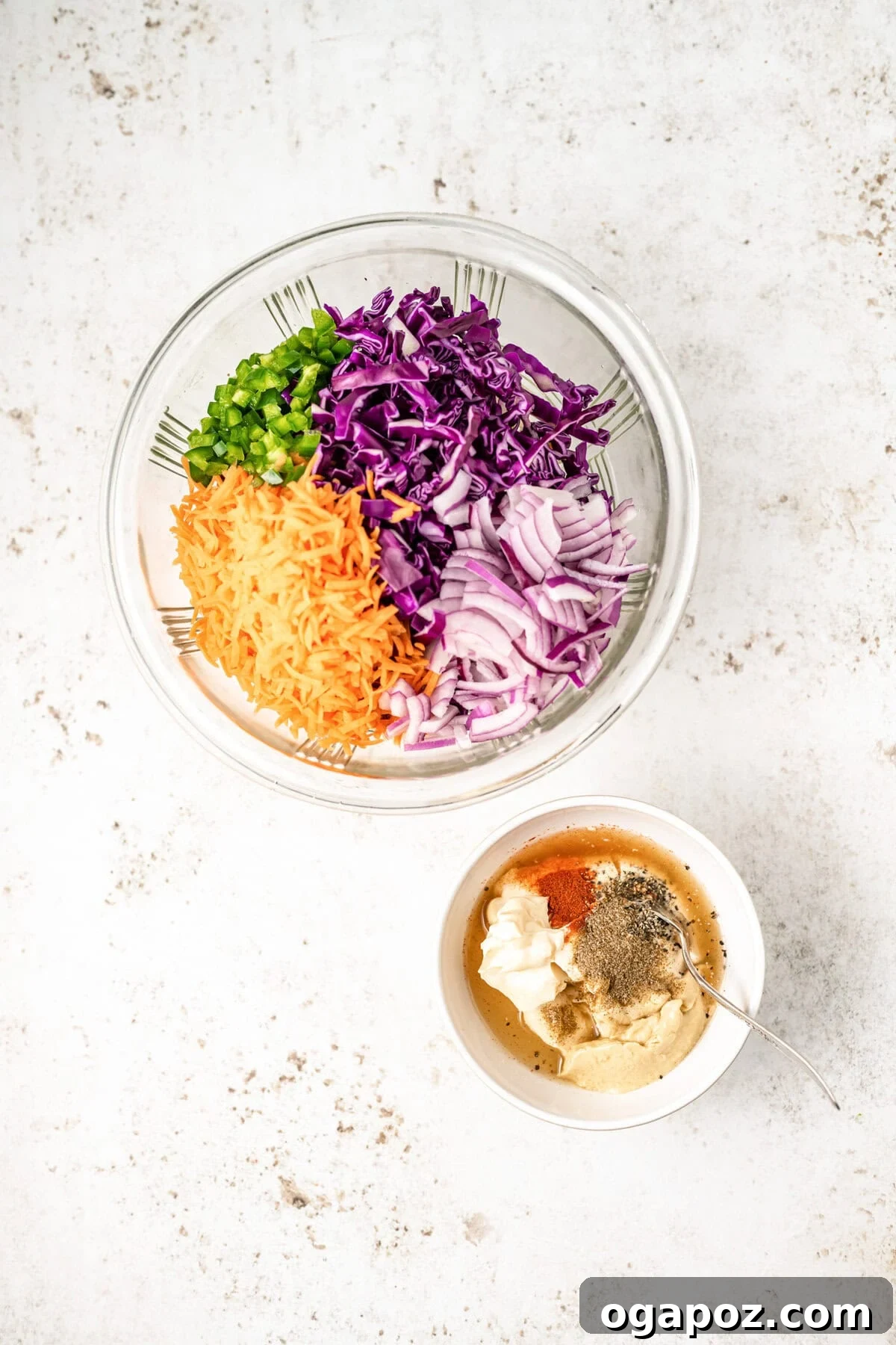 Kickin' Creamy Jalapeno Coleslaw 8 Shredded cabbage, carrots, red onion, and diced jalapeños mixed in a large bowl, ready for the dressing.