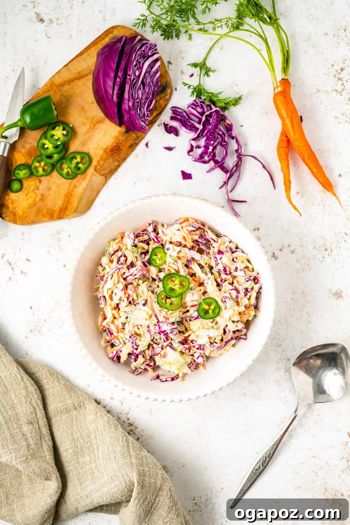Kickin' Creamy Jalapeno Coleslaw 9 Delicious Jalapeno Coleslaw ready to serve in a rustic bowl.
