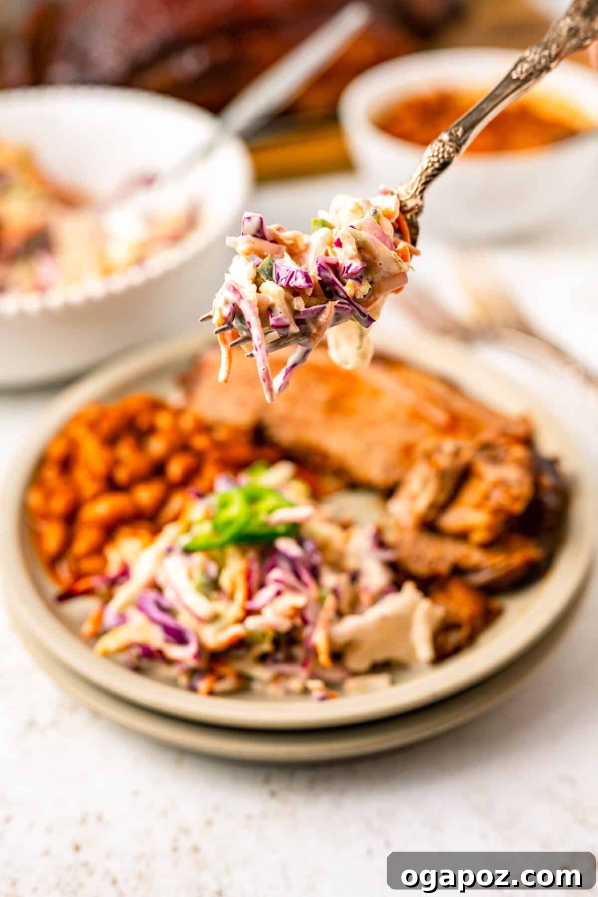 Kickin' Creamy Jalapeno Coleslaw 10 Jalapeno Coleslaw served on a plate next to a main dish, showcasing its vibrant appeal.