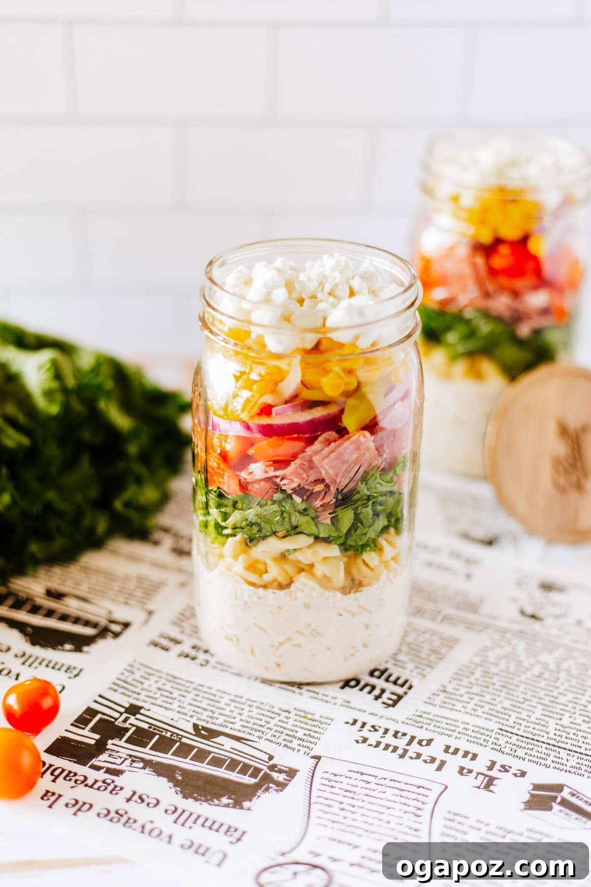 Portable Italian Pasta Salad Jars 9 A collection of prepped Italian Pasta Mason Jar Salads, ready for the week.