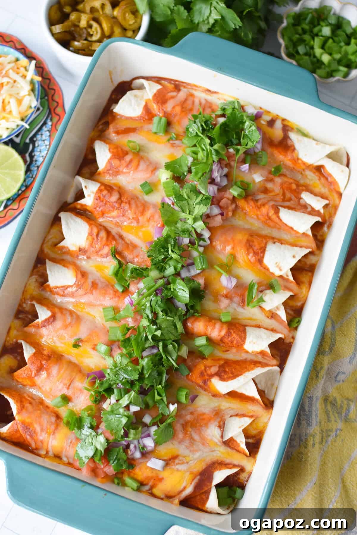 Weeknight Pork Enchilada Bliss 4 A bubbling casserole dish filled with baked pork enchiladas, topped with vibrant fresh garnishes