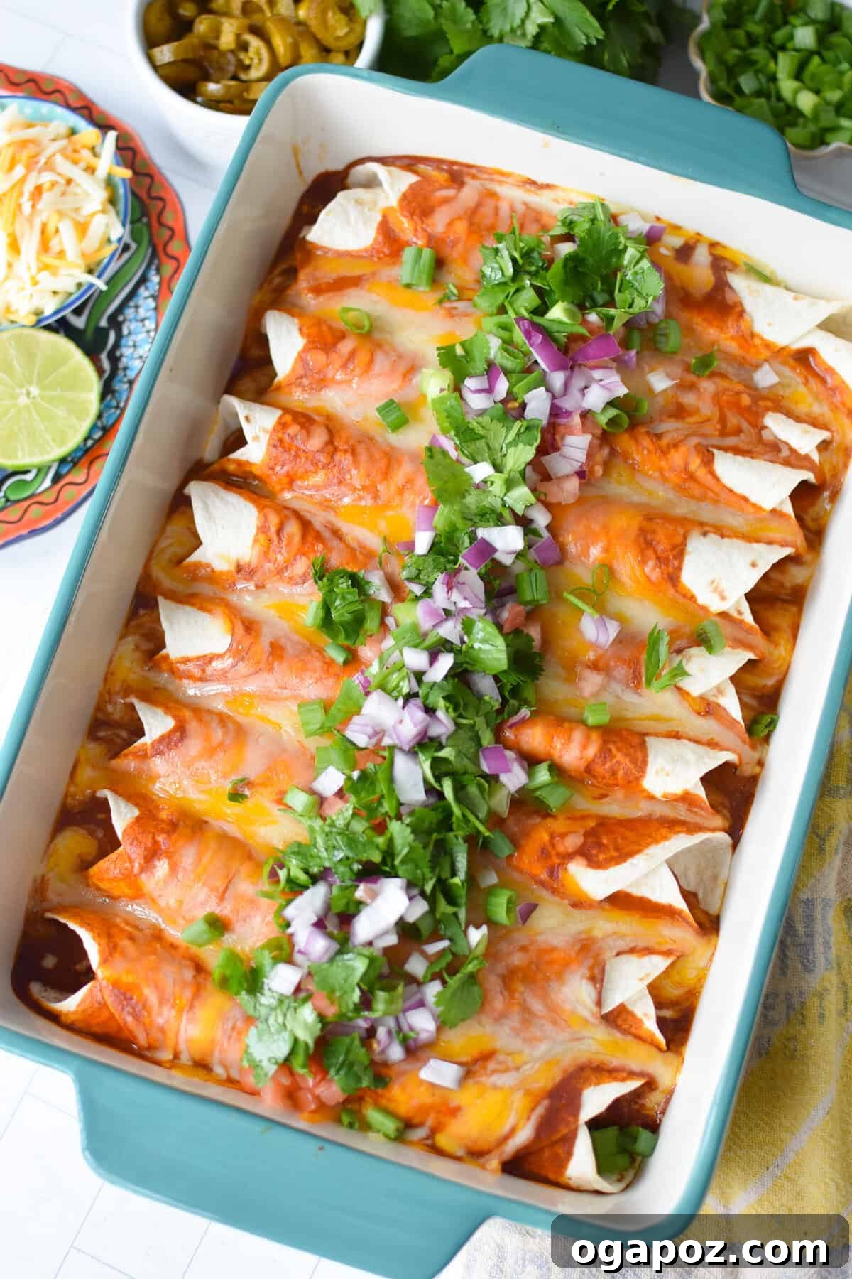 Weeknight Pork Enchilada Bliss 8 Plated pork enchiladas generously garnished with fresh cilantro, diced red onion, and chopped tomatoes