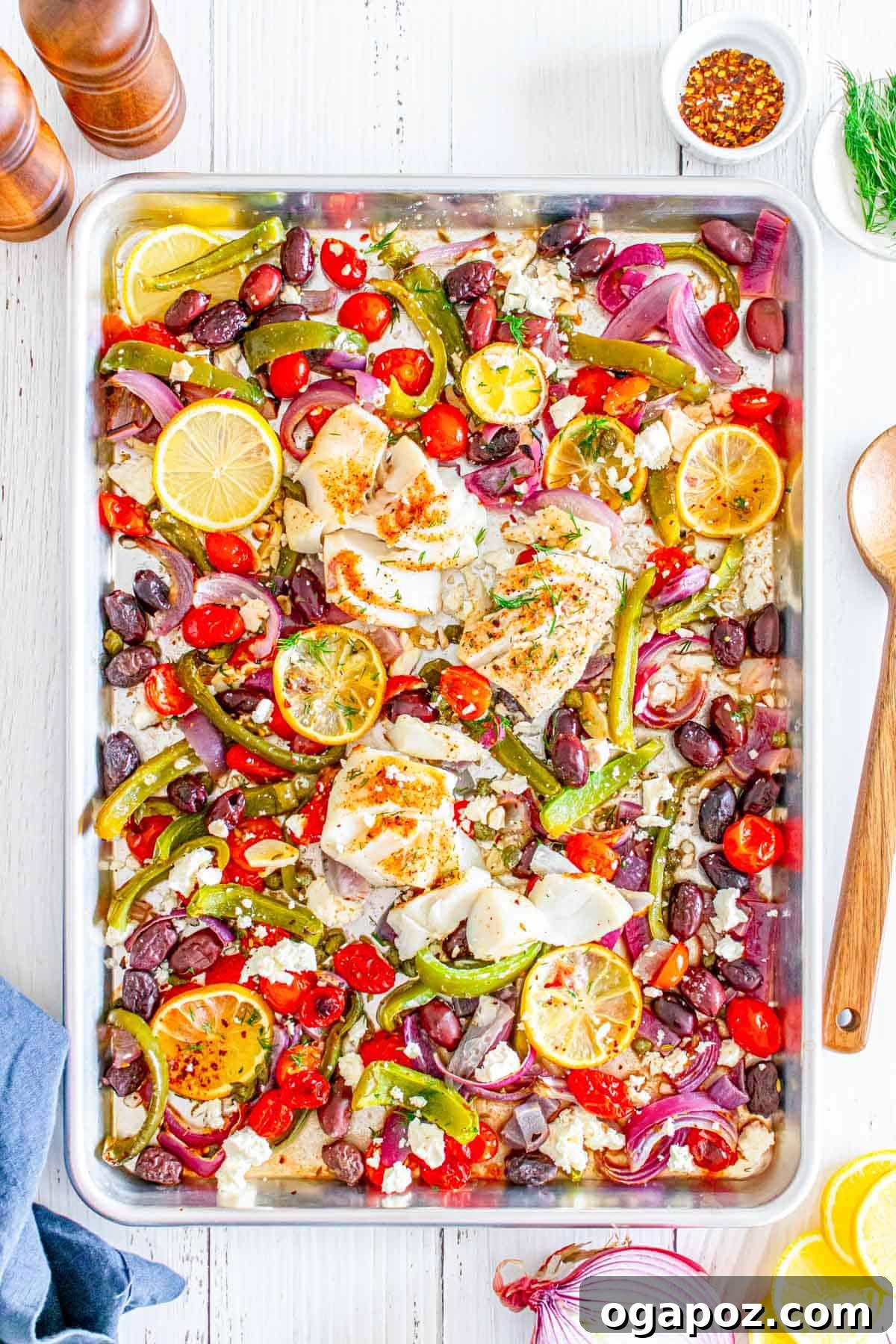 Sunny Mediterranean Cod Sheet Pan Bake 7 Sheet Pan Mediterranean Cod on sheet pan with spoon