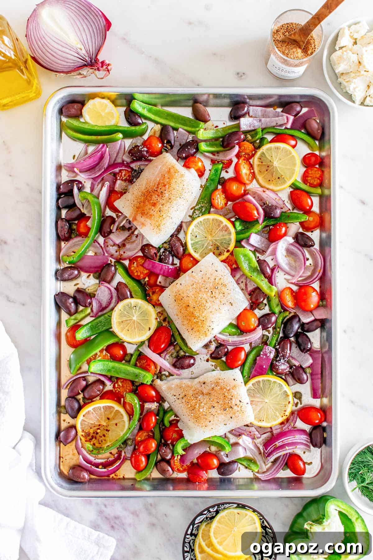 Sunny Mediterranean Cod Sheet Pan Bake 9 Sheet Pan Mediterranean Cod with fish on a sheet pan