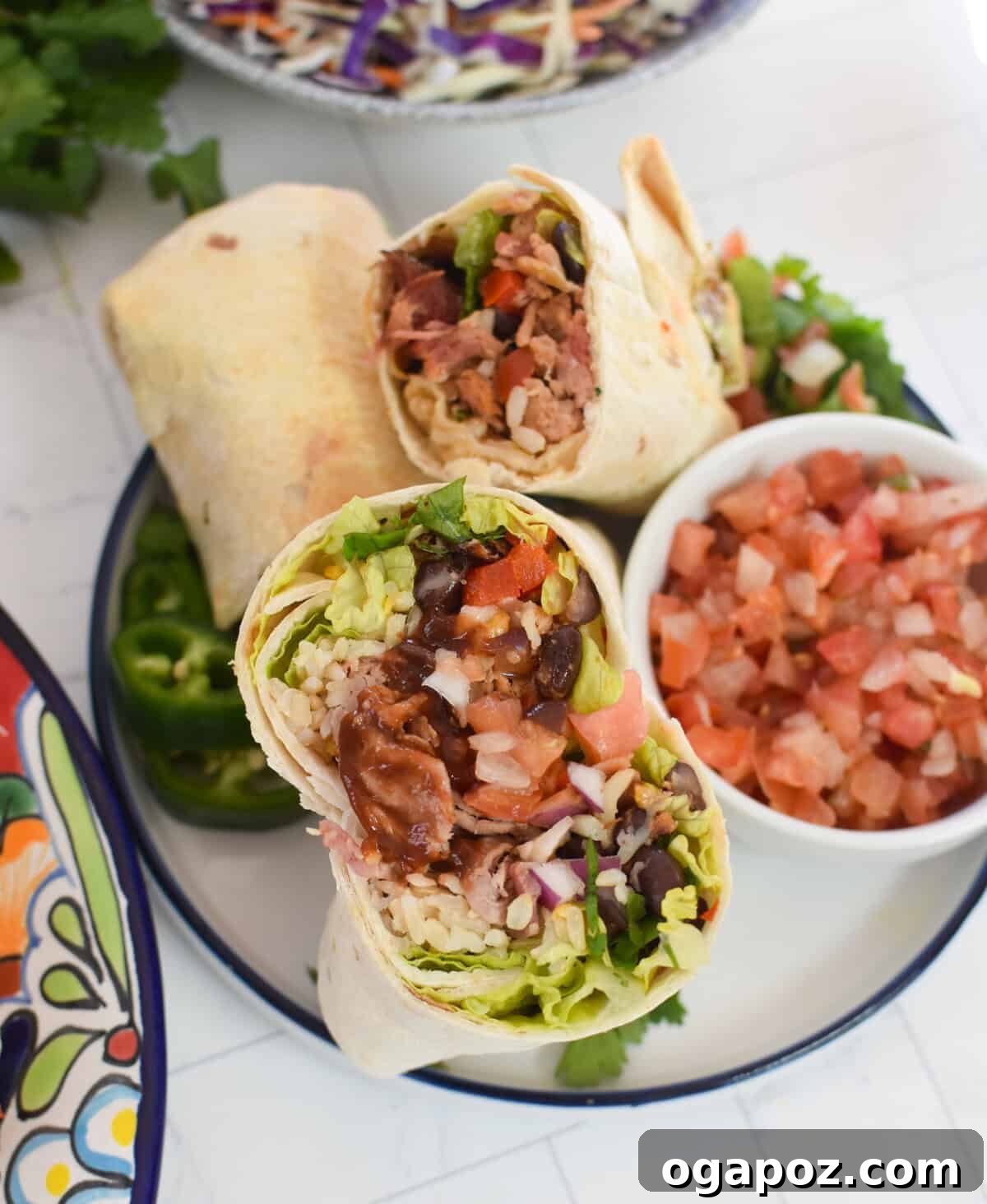 Ultimate Pulled Pork Wraps 6 Pulled Pork Burritos on a white plate
