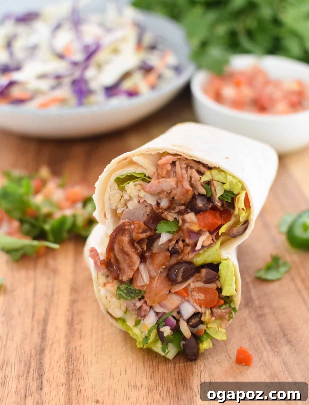 Ultimate Pulled Pork Wraps 10 Pulled Pork Burritos on a cutting board