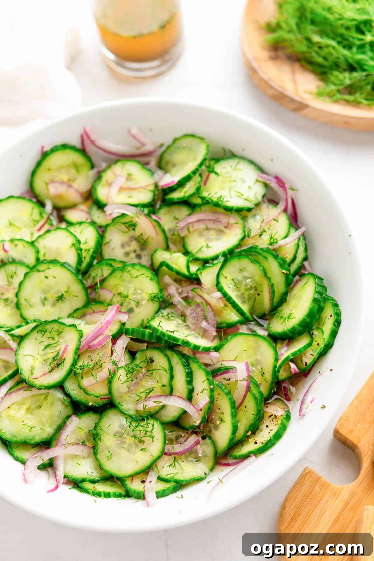 Cucumber Onion Salad in a white bowl