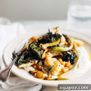 Golden Roasted Cauliflower, Kale & Crispy Chickpea Salad 6 A smaller plate of Kale, Cauliflower, and Chickpea Salad with yogurt, showcasing the crispy texture.