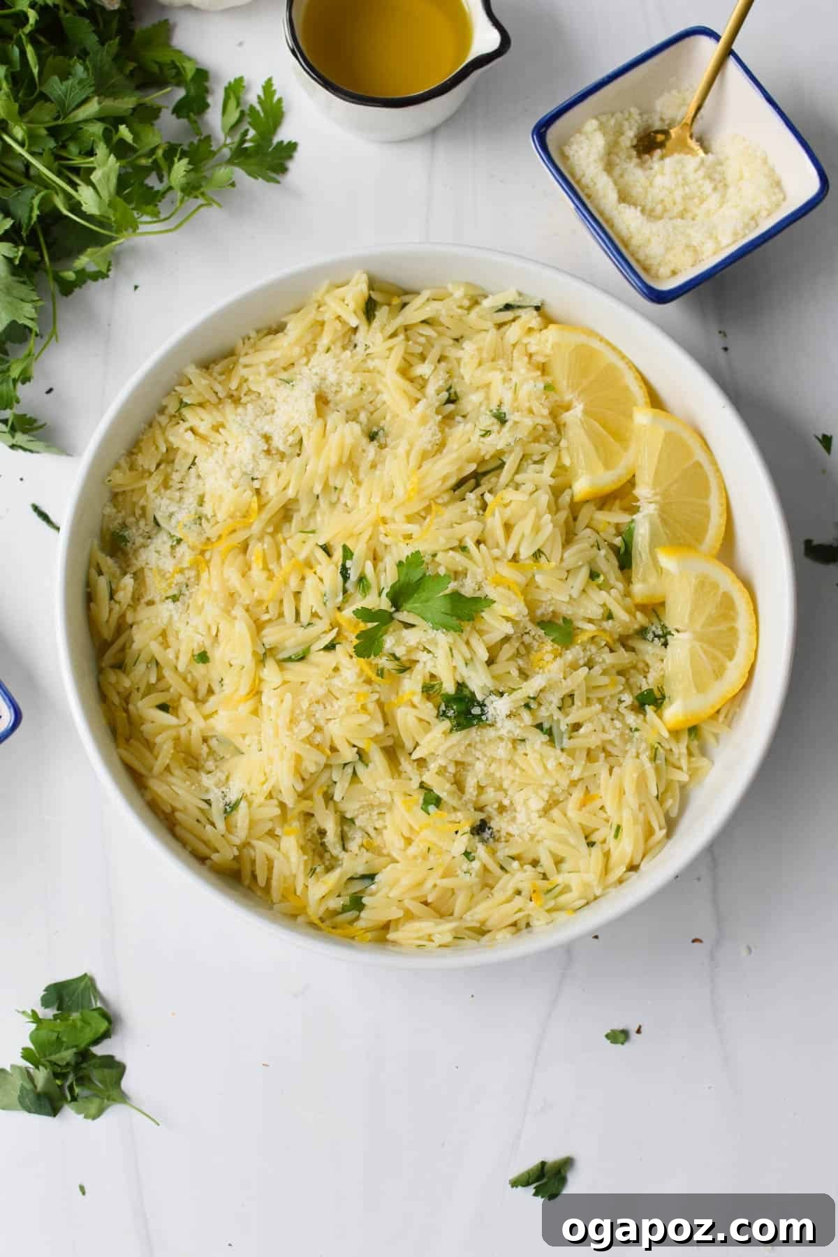 Bright Lemon Orzo Pasta 3 Lemon Orzo Recipe in a white bowl, ready to be served.