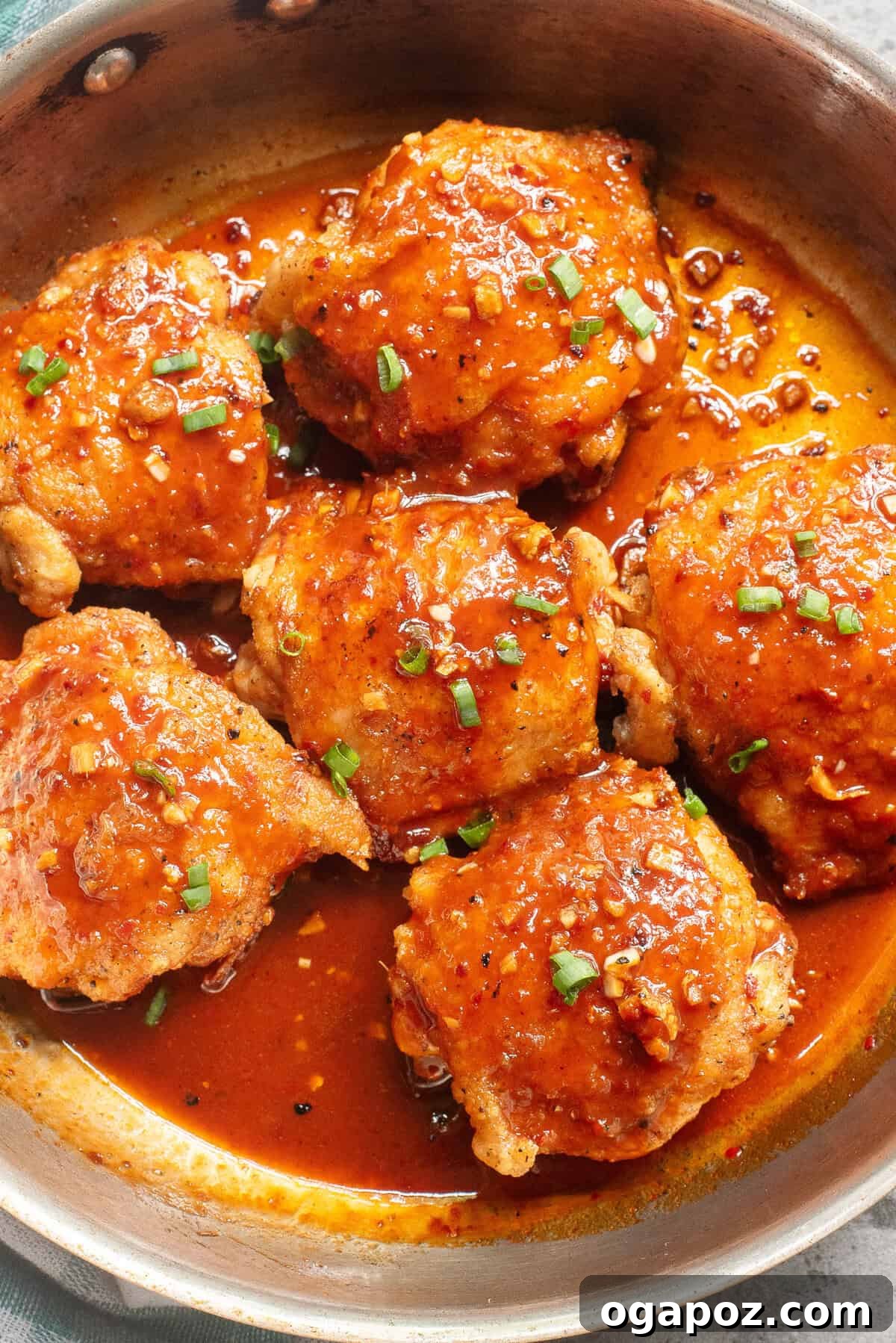 Sticky Honey Ginger Chicken 2 Honey Ginger Chicken sizzling in a skillet