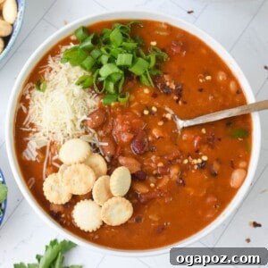 Instant Pot 15 Bean Soup in a bowl with a spoon.