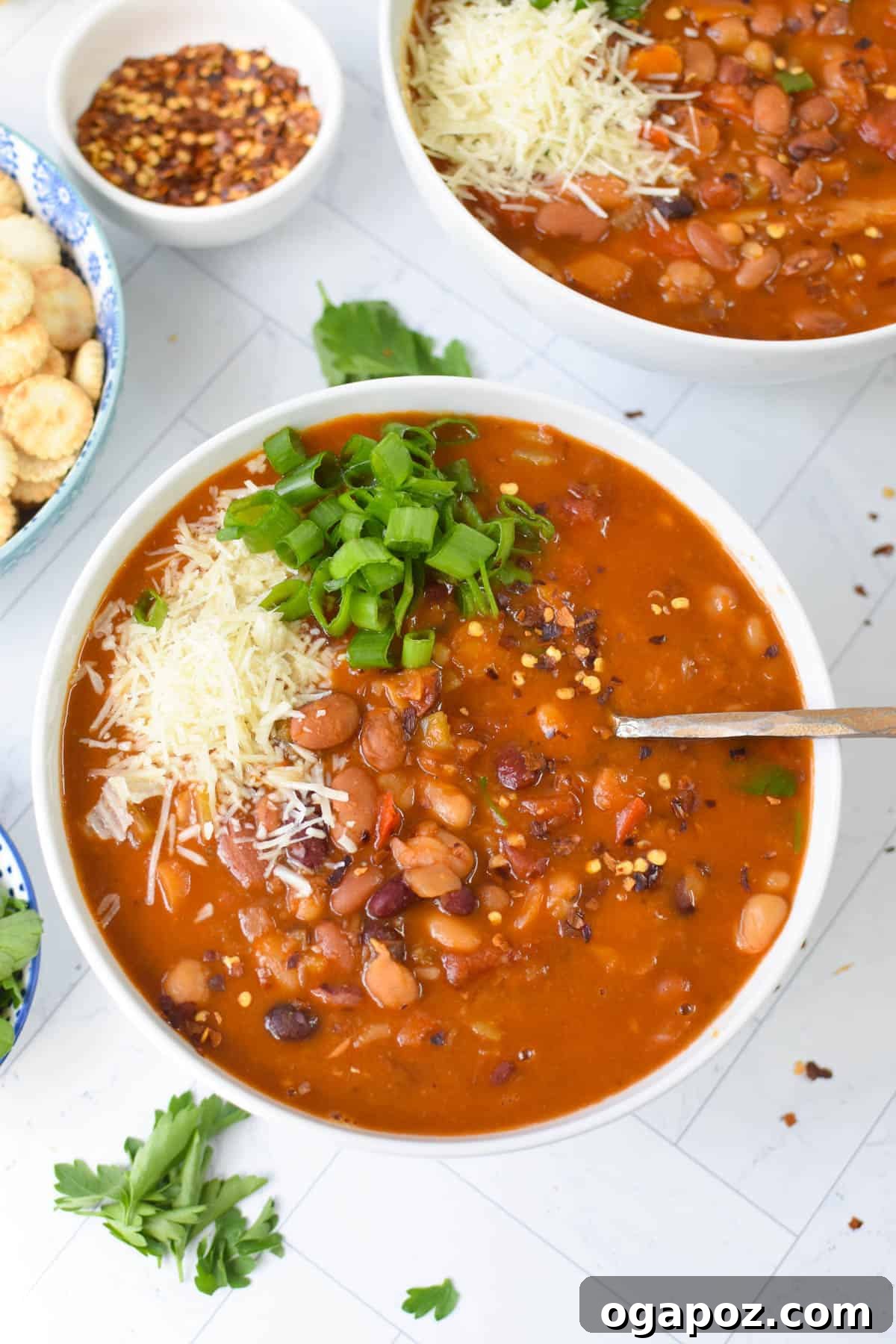Hearty Instant Pot 15 Bean Soup 3 A serving of Instant Pot 15 Bean Soup with a spoon, highlighting its texture.