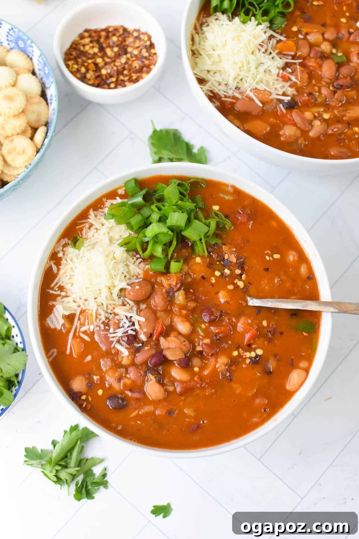 Hearty Instant Pot 15 Bean Soup 7 Instant Pot 15 Bean Soup garnished with cheese.