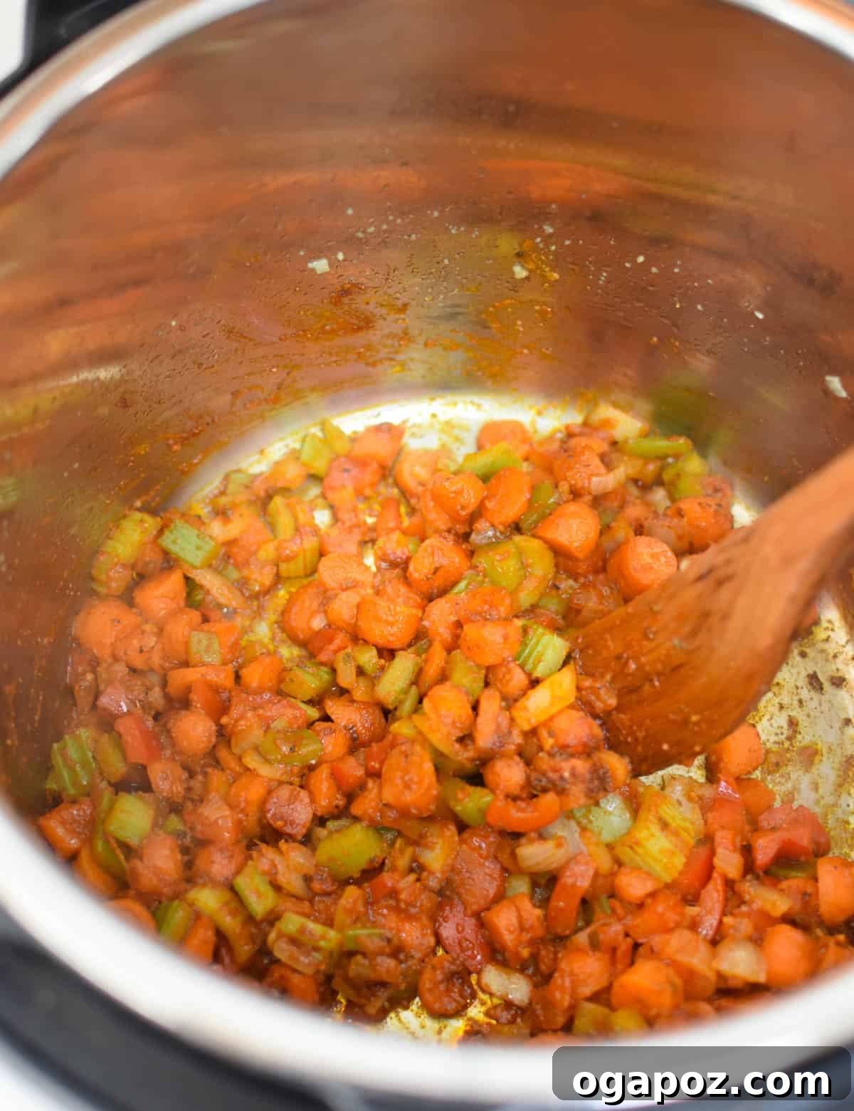 Hearty Instant Pot 15 Bean Soup 9 Sautéing vegetables in an Instant Pot for the 15 bean soup.