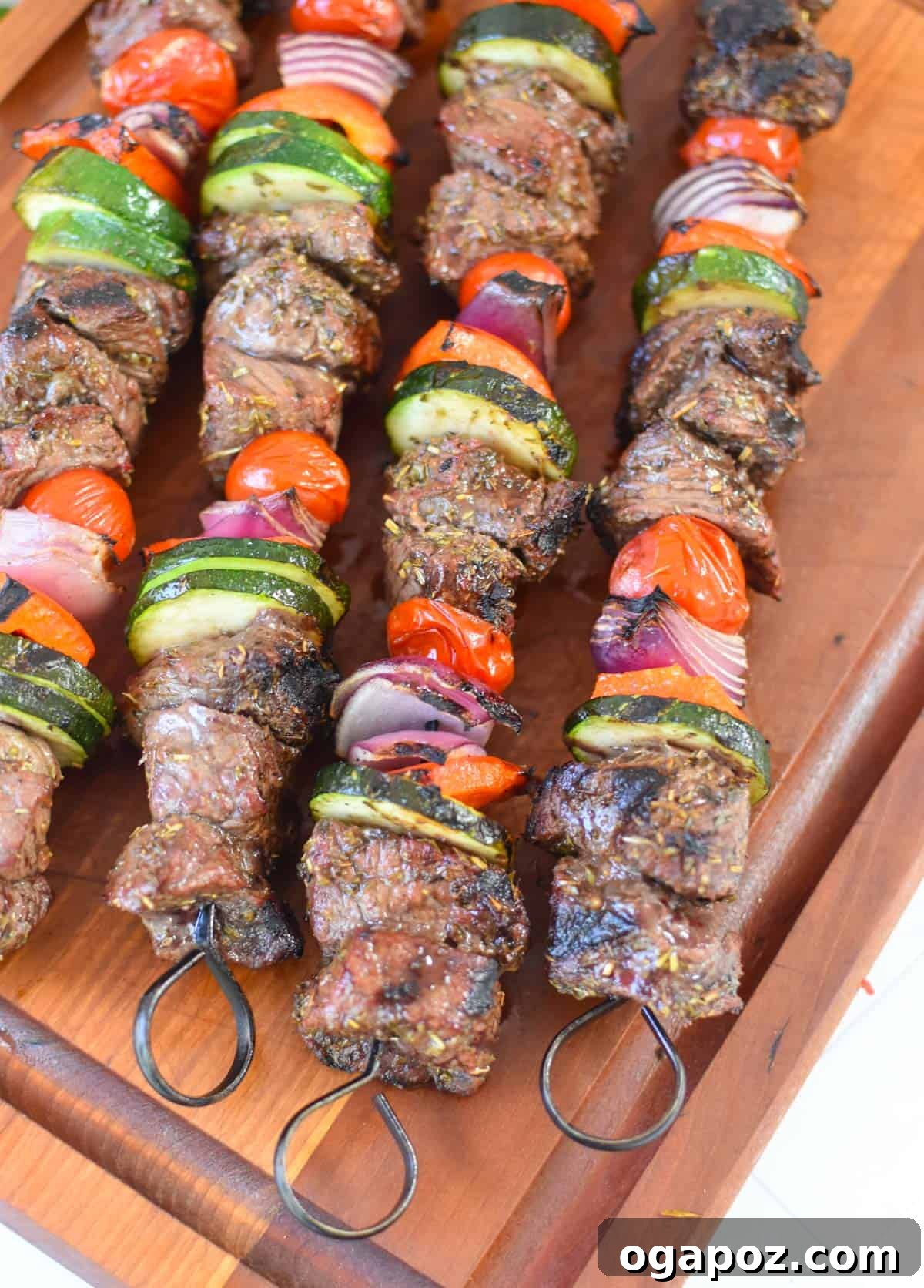 Grilled Beef Souvlaki Skewers 13 Sliced beef from the Beef Souvlaki on a cutting board, showing the juicy interior.