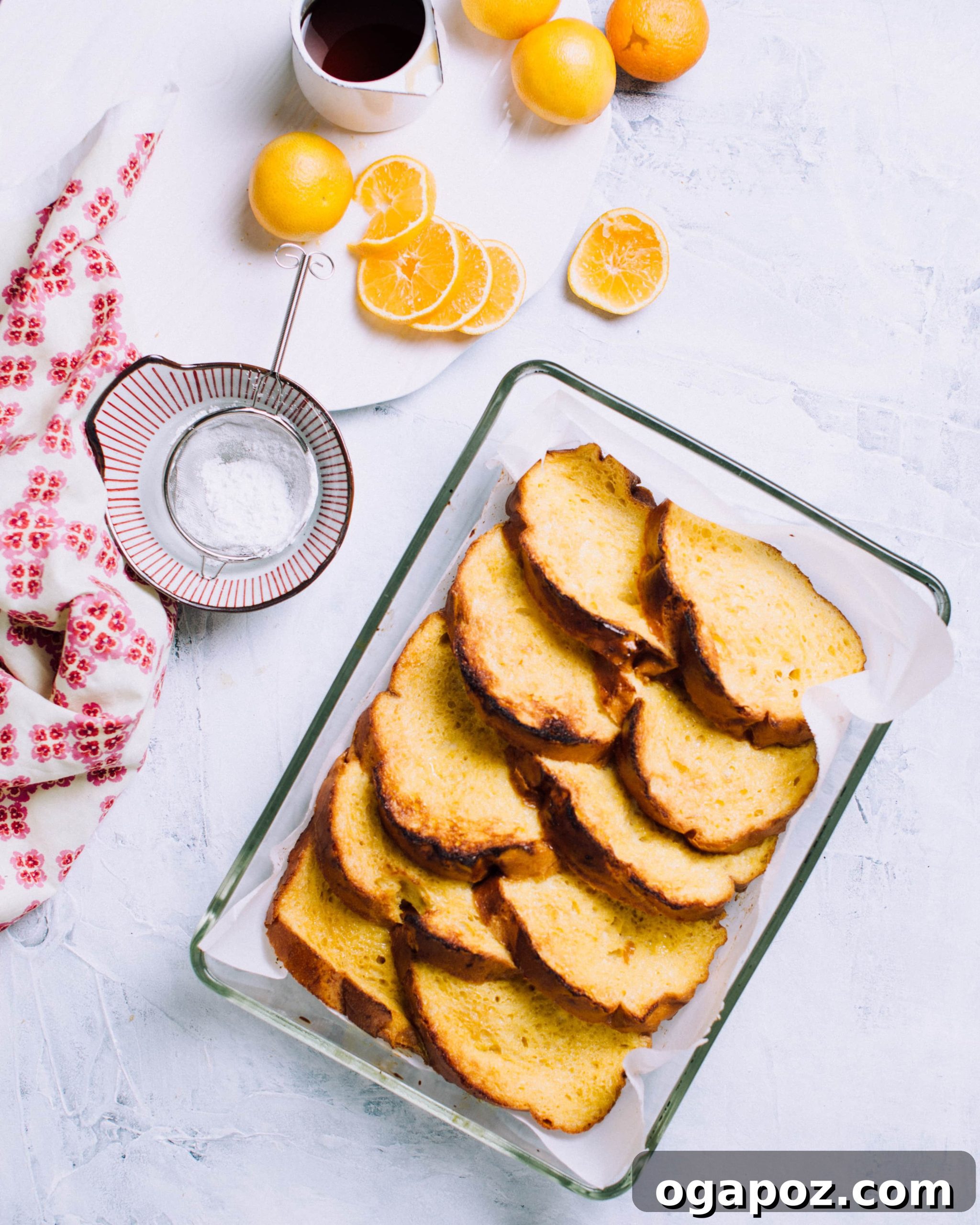 Zesty Orange French Toast Bake 5 Orange French Toast Casserole meticulously assembled in a baking pan, ready for its overnight chill or immediate baking.