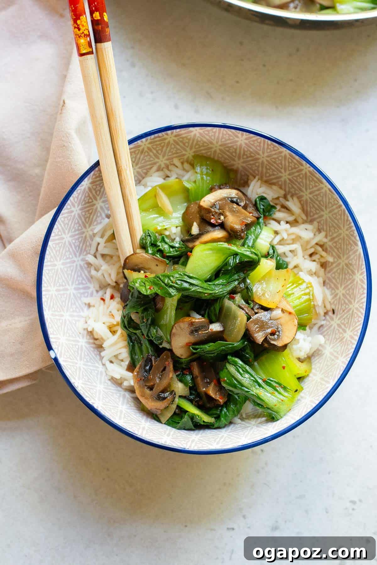 Vibrant Garlic Bok Choy Sauté 3 Bok Choy Stir Fry in a bowl with chopsticks, ready to be eaten.