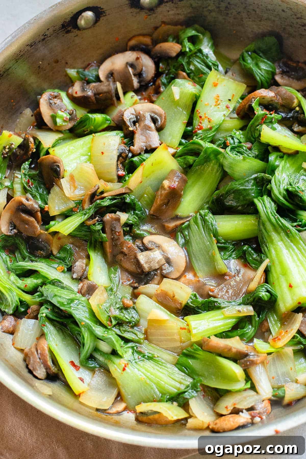 Vibrant Garlic Bok Choy Sauté 9 Close-up of Bok Choy Stir Fry in a pan, garnished and ready to serve.