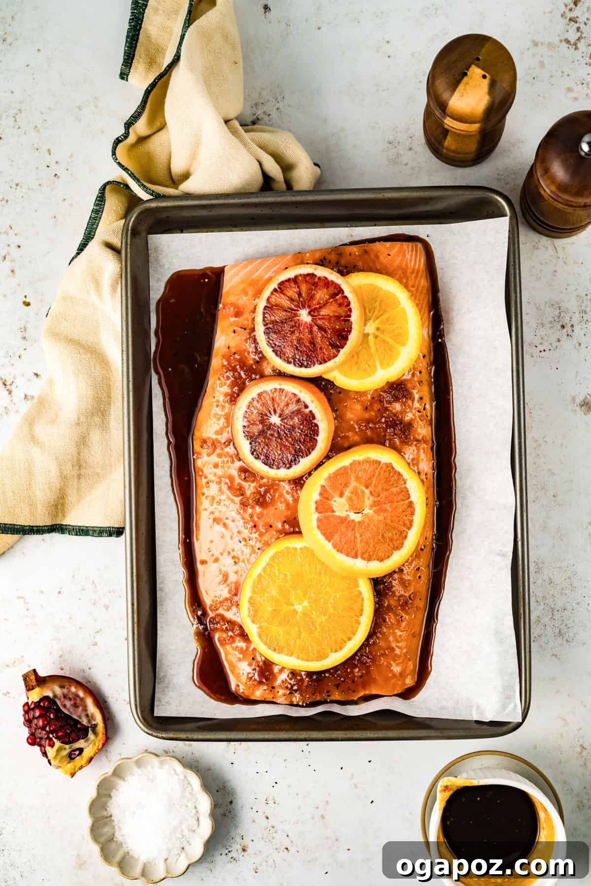 Zesty Orange Glazed Salmon 8 Orange Glazed Salmon being coated with the sweet and tangy glaze.