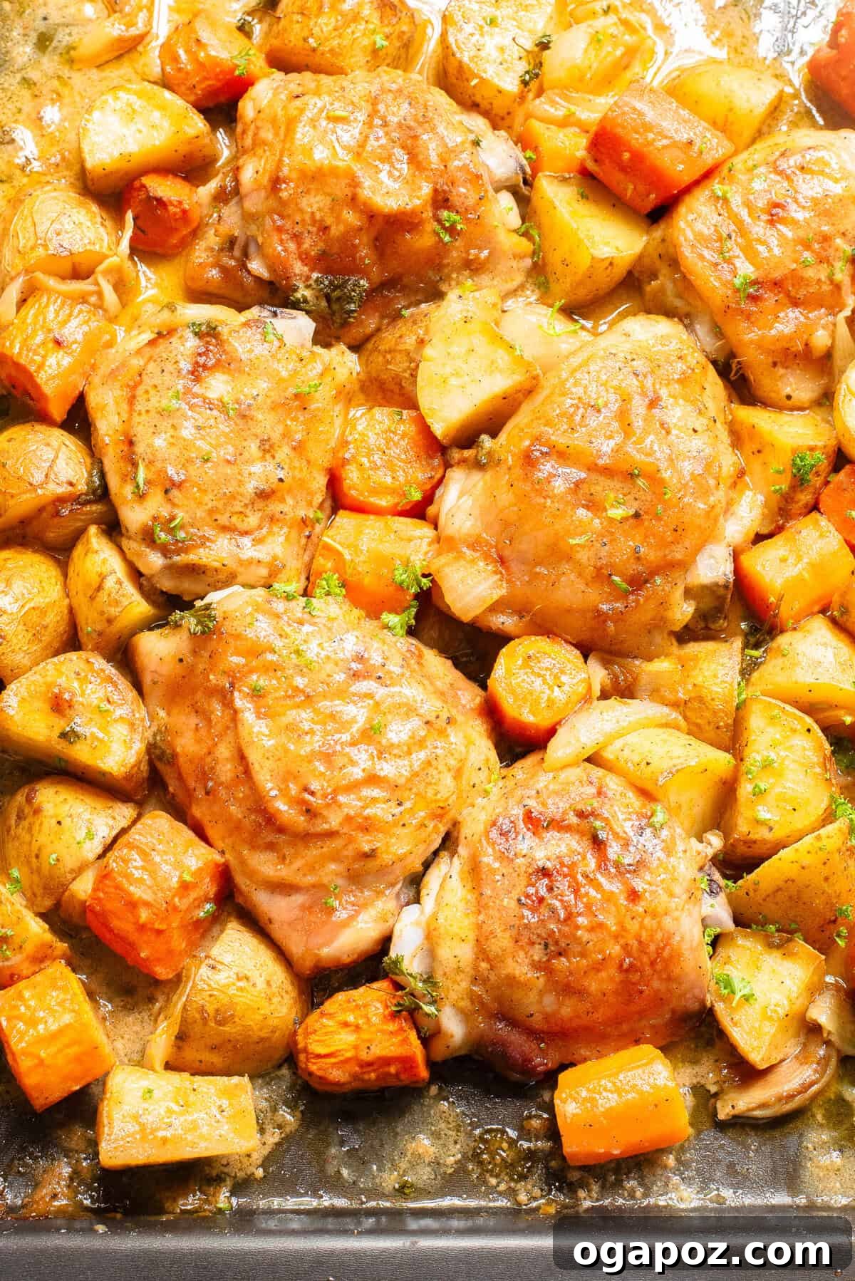 Golden Honey Mustard Sheet Pan Chicken Thighs 3 Sheet Pan Honey Mustard Chicken Thighs with potatoes and carrots close up