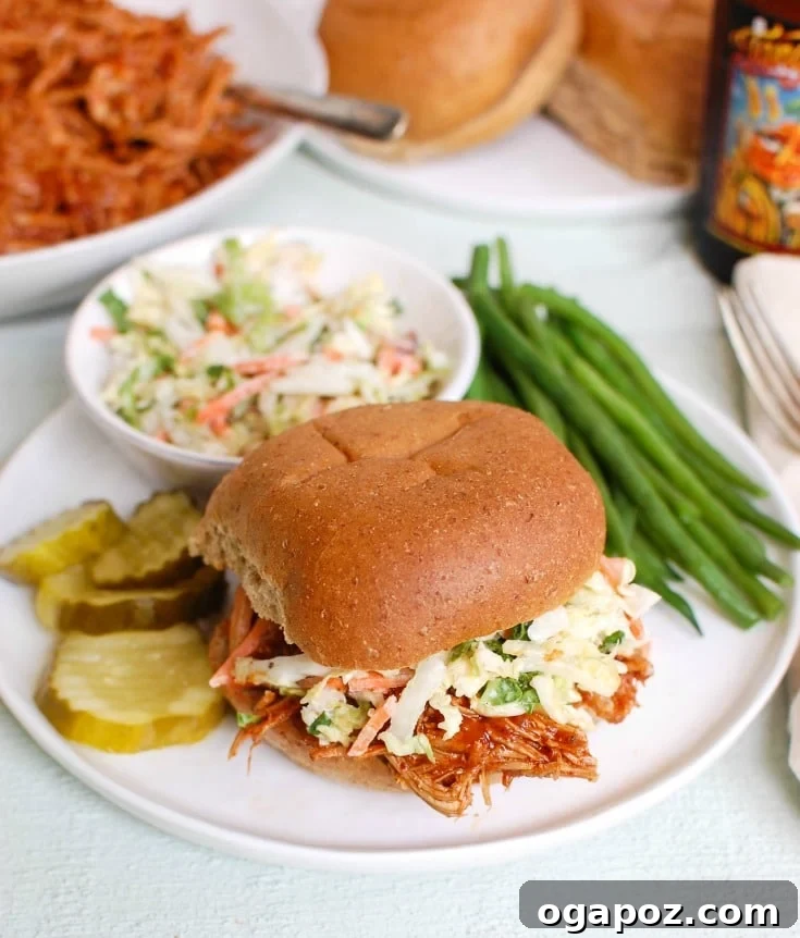 Fall-Apart Tender Slow Cooker BBQ Pulled Pork 4 Slow Cooker Barbecue Pulled Pork with bun