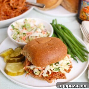 Fall-Apart Tender Slow Cooker BBQ Pulled Pork 5 Slow Cooker Barbecue Pulled Pork with bun