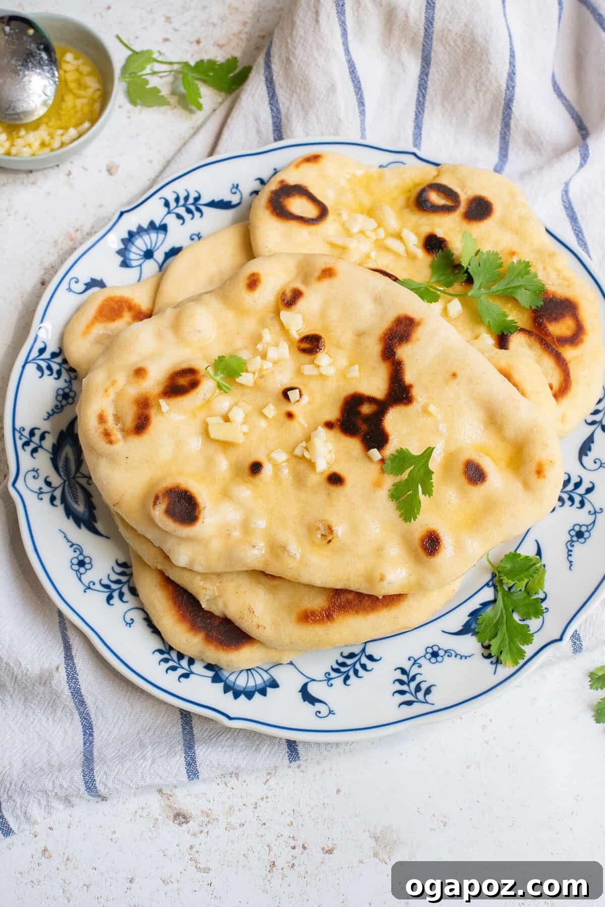 Foolproof Homemade Naan 2 Easy Homemade Naan on blue plate